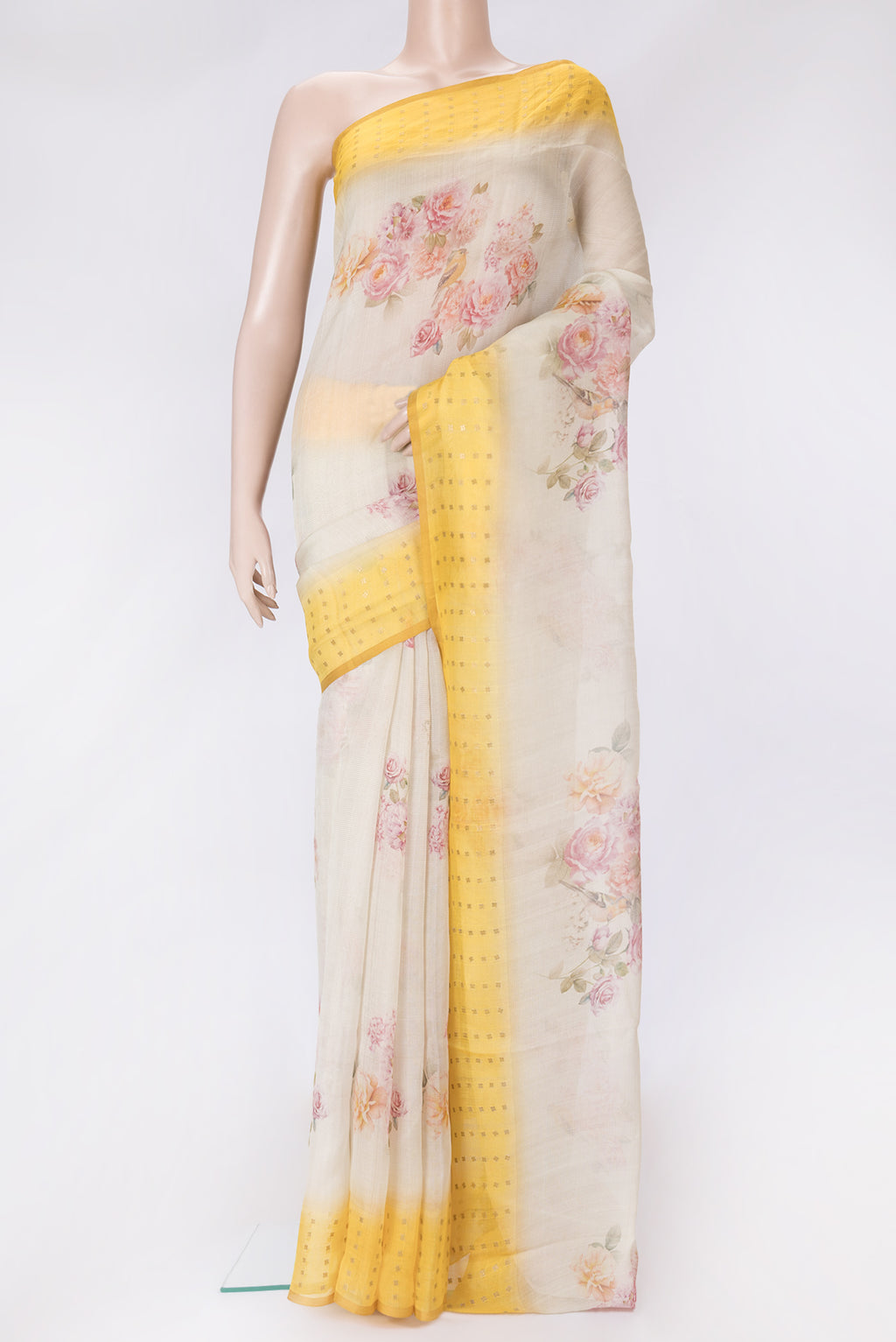 Beige Dual Tone Tussar Silk Saree with Printed design on the body and Printed Border.  displayed on a mannequin
