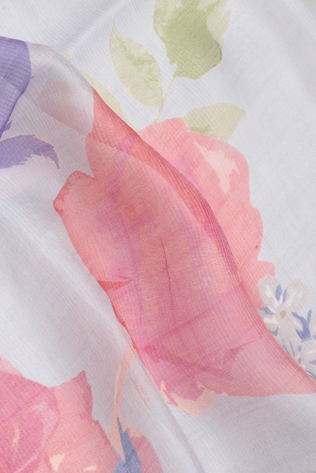Close up of Grey Dual Tone Tussar Silk Saree with Stripes on the body and Embroidery Border.  displaying folds