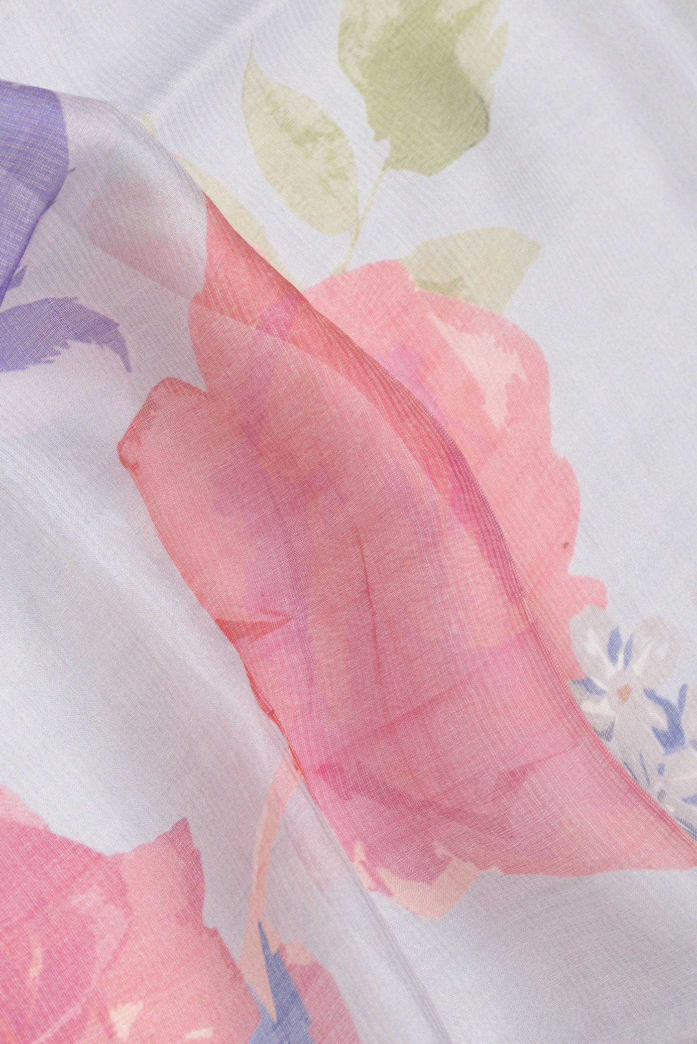 Close up of Grey Dual Tone Tussar Silk Saree with Stripes on the body and Embroidery Border.  displaying folds