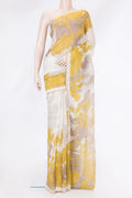 Beige Dual Tone Tussar Silk Saree with Printed design on the body and Zari Border.  displayed on a mannequin