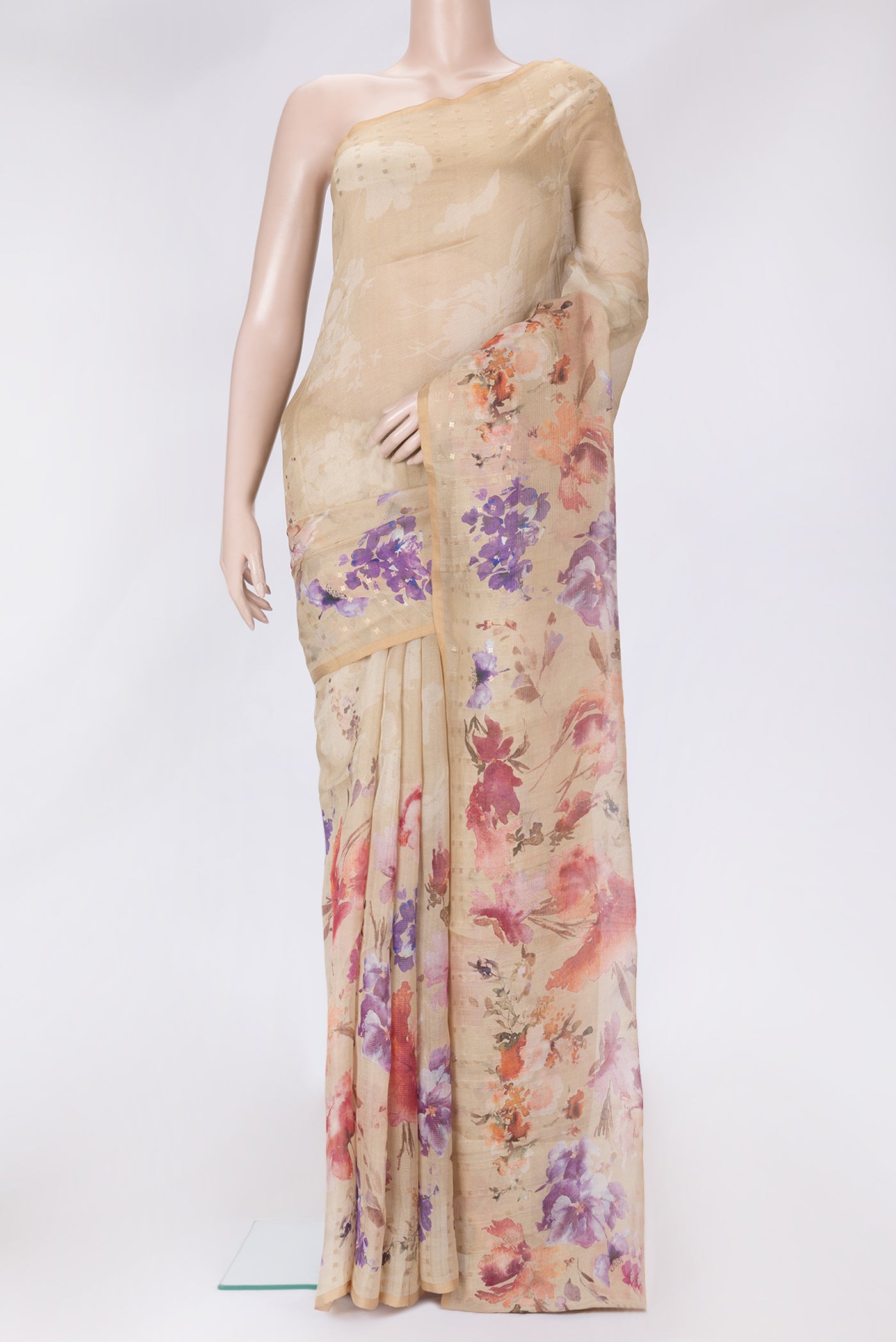 Caramel Dual Tone Tussar Silk Saree with Printed design on the body and Embroidery Border.  displayed on a mannequin