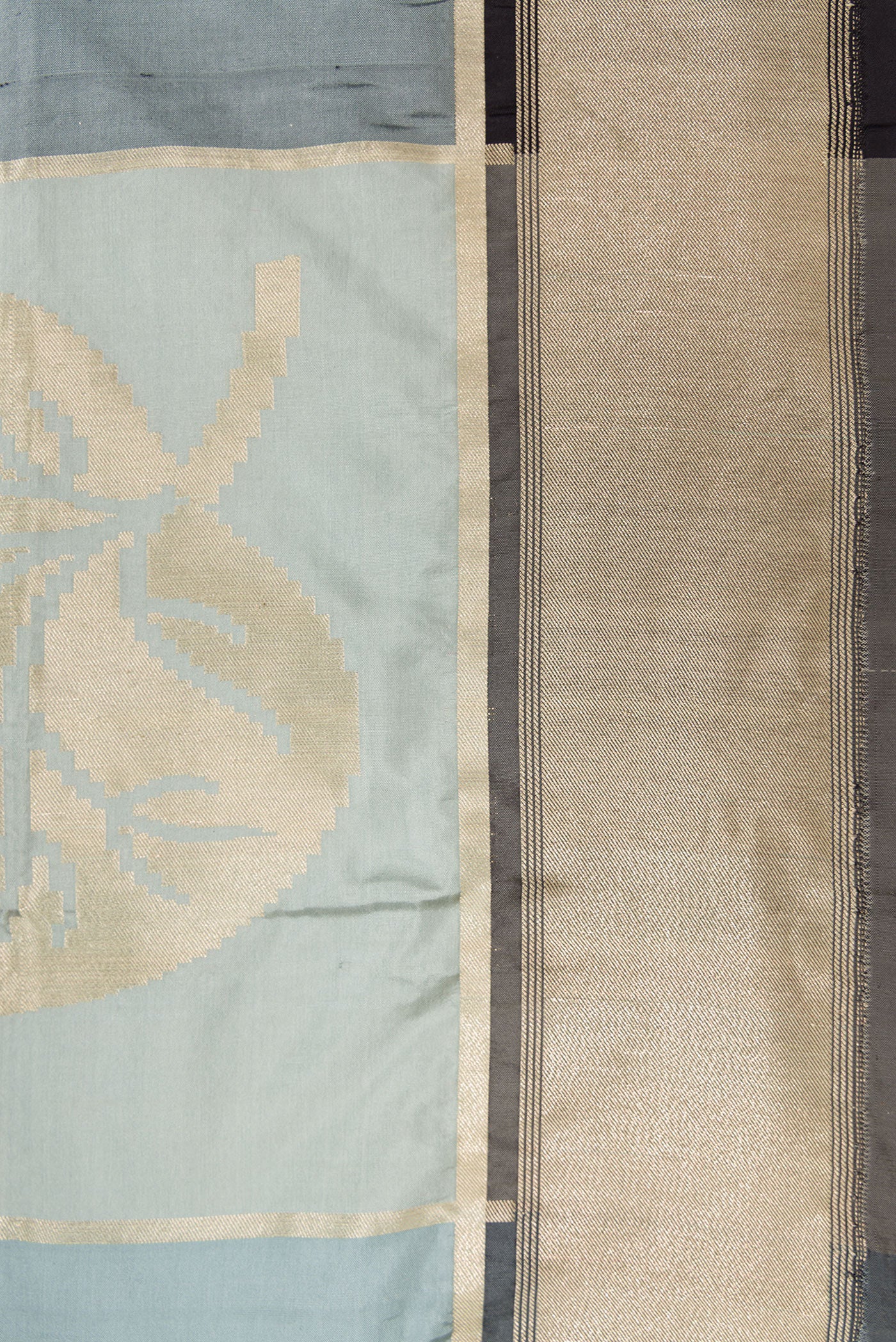 Border image of Black, Grey and Off White Color Banarasi Silk Saree with Zari Brocade on the body and Zari Border. 