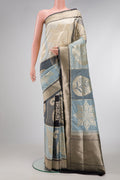 Black, Grey and Off White Color Banarasi Silk Saree with Zari Brocade on the body and Zari Border.  displayed on a mannequin