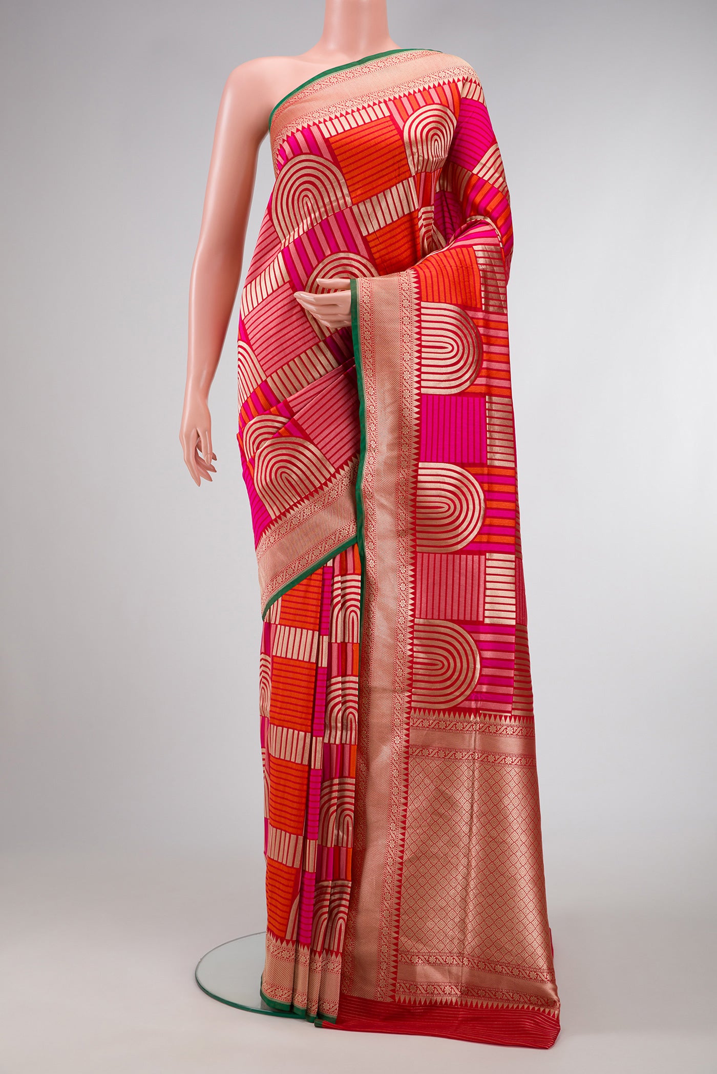 Red Dual Tone Banarasi Silk Saree with Zari Brocade on the body and Zari Border.  displayed on a mannequin