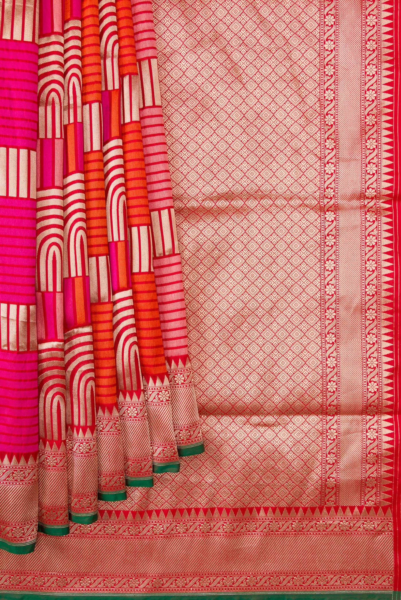 Pleats and pallu of Red Dual Tone Banarasi Silk Saree with Zari Brocade on the body and Zari Border. 
