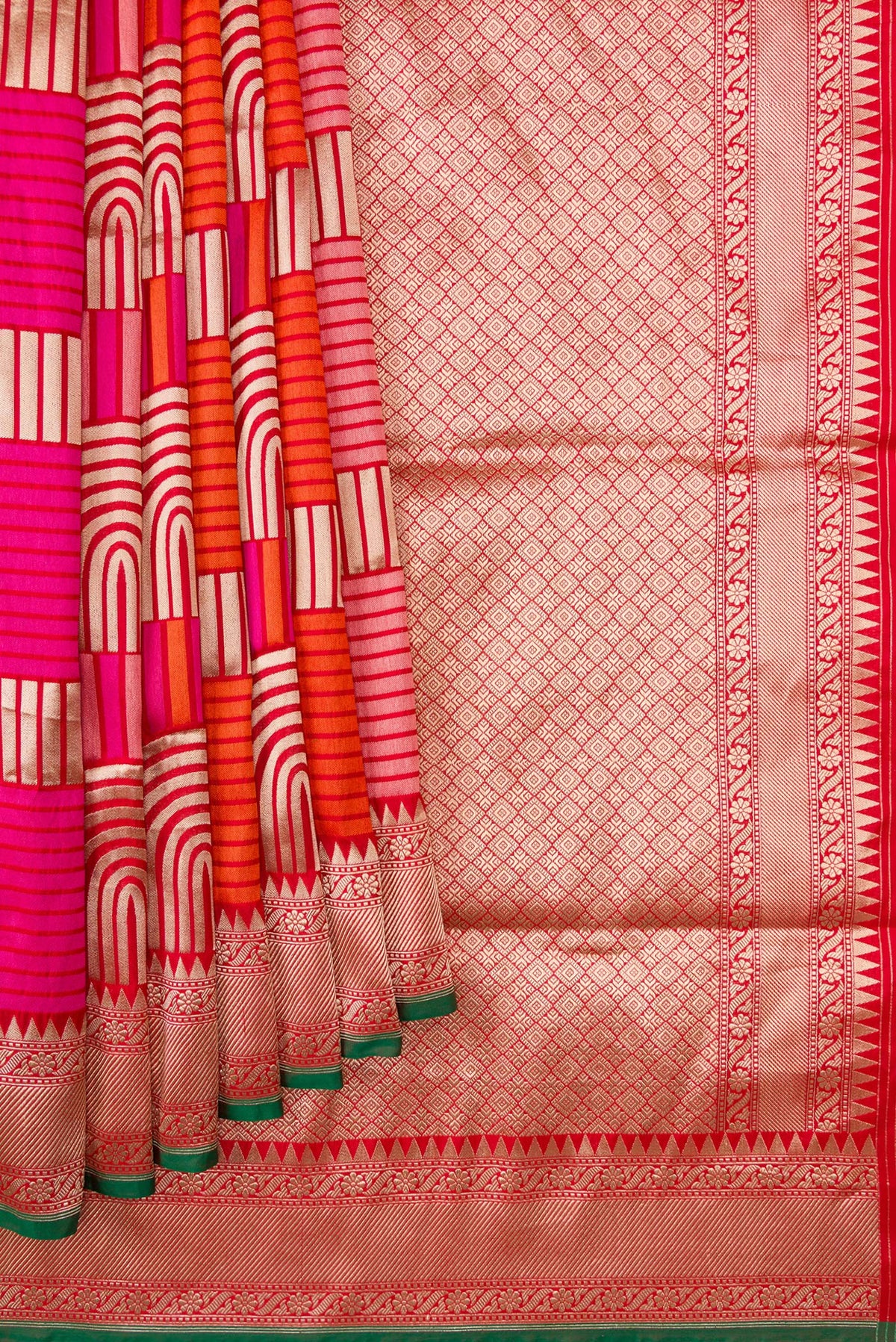 Pleats and pallu of Red Dual Tone Banarasi Silk Saree with Zari Brocade on the body and Zari Border. 