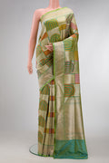 Green Dual Tone Banarasi Silk Saree with Zari Brocade on the body and Zari Border.  displayed on a mannequin