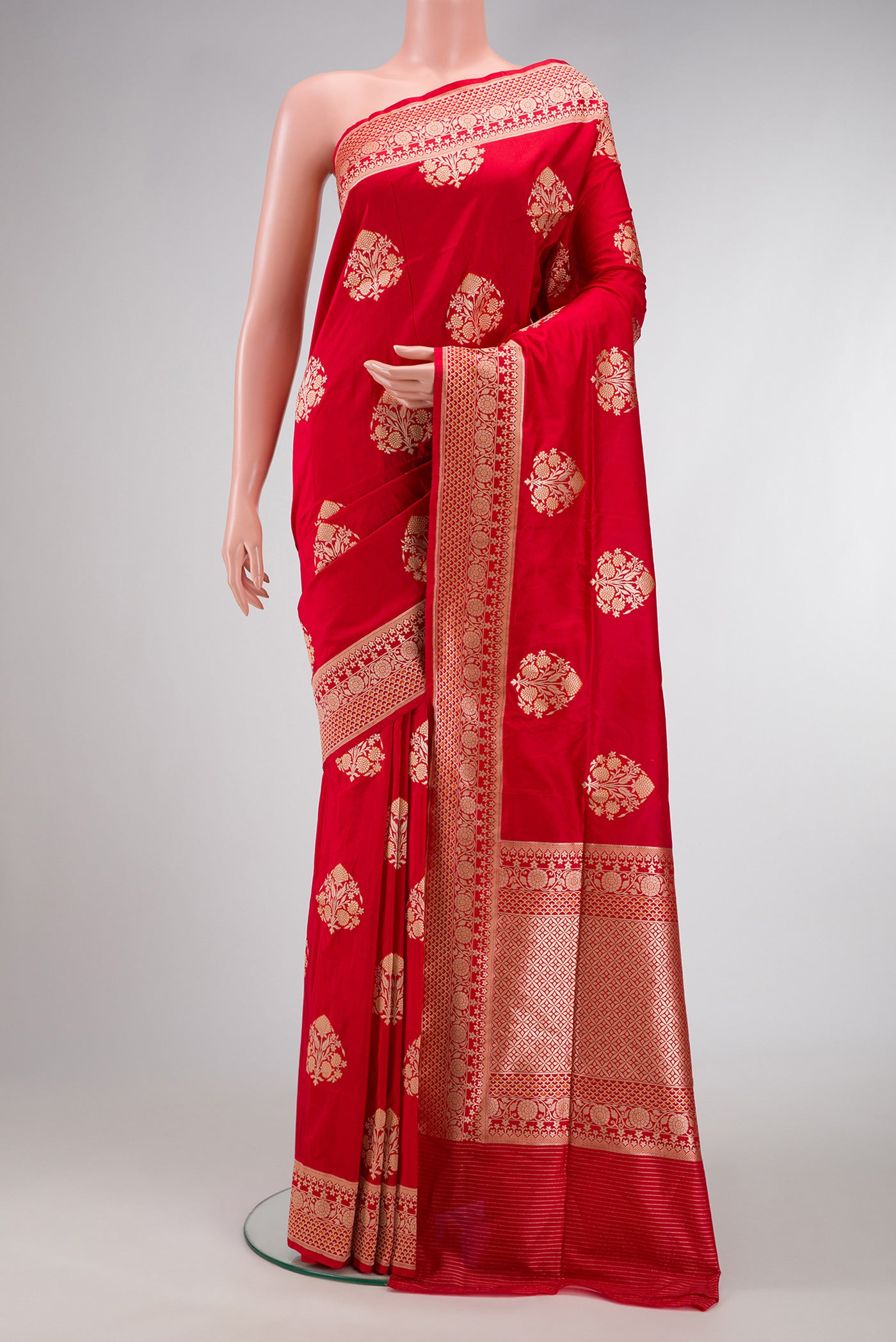 Red Dual Tone Banarasi Silk Saree with Zari And Thread Butta on the body and Zari Border.  displayed on a mannequin