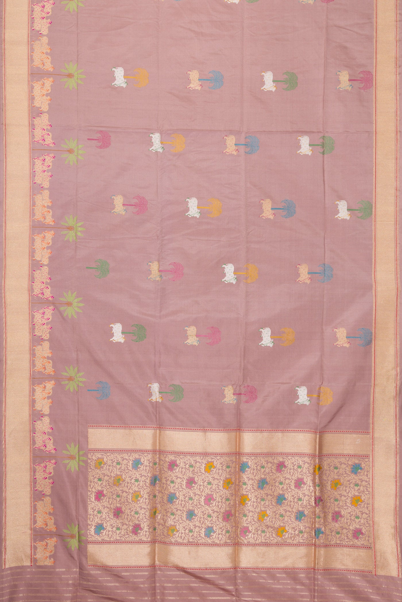 Flat view of Rose Gold Dual Tone Banarasi Silk Saree with Zari And Thread Butta on the body and Fancy Border. 