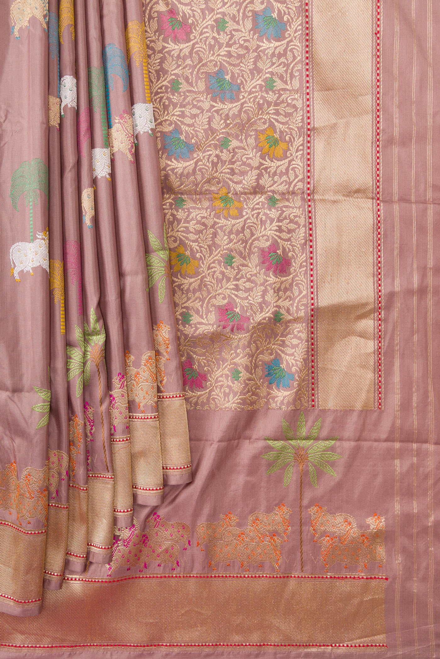 Pleats and pallu of Rose Gold Dual Tone Banarasi Silk Saree with Zari And Thread Butta on the body and Fancy Border. 