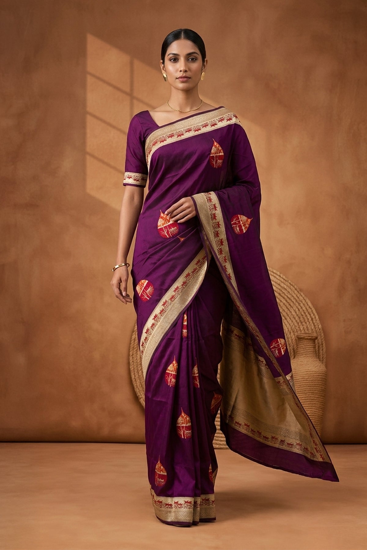 Model wearing a Purple Banarasi Silk Saree with Zari And Thread Butta on the body and Zari Border.