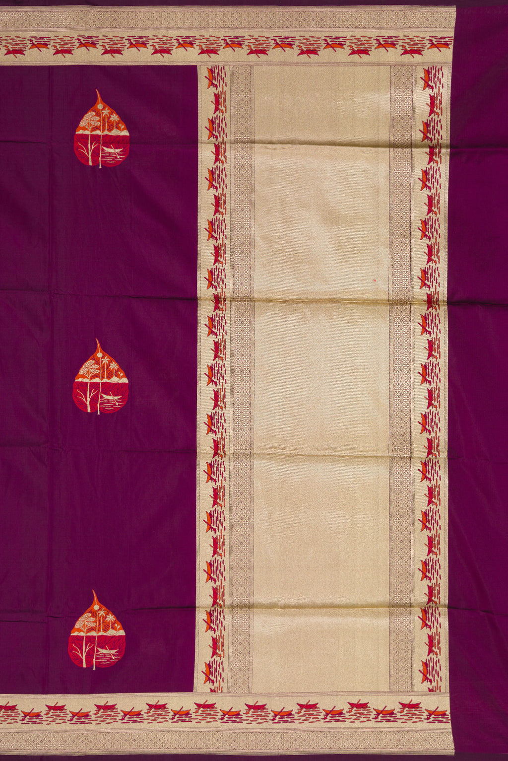 Close up image of the pallu of Burgundy Dual Tone Banarasi Silk Saree with Zari And Thread Butta on the body and Fancy Border. 