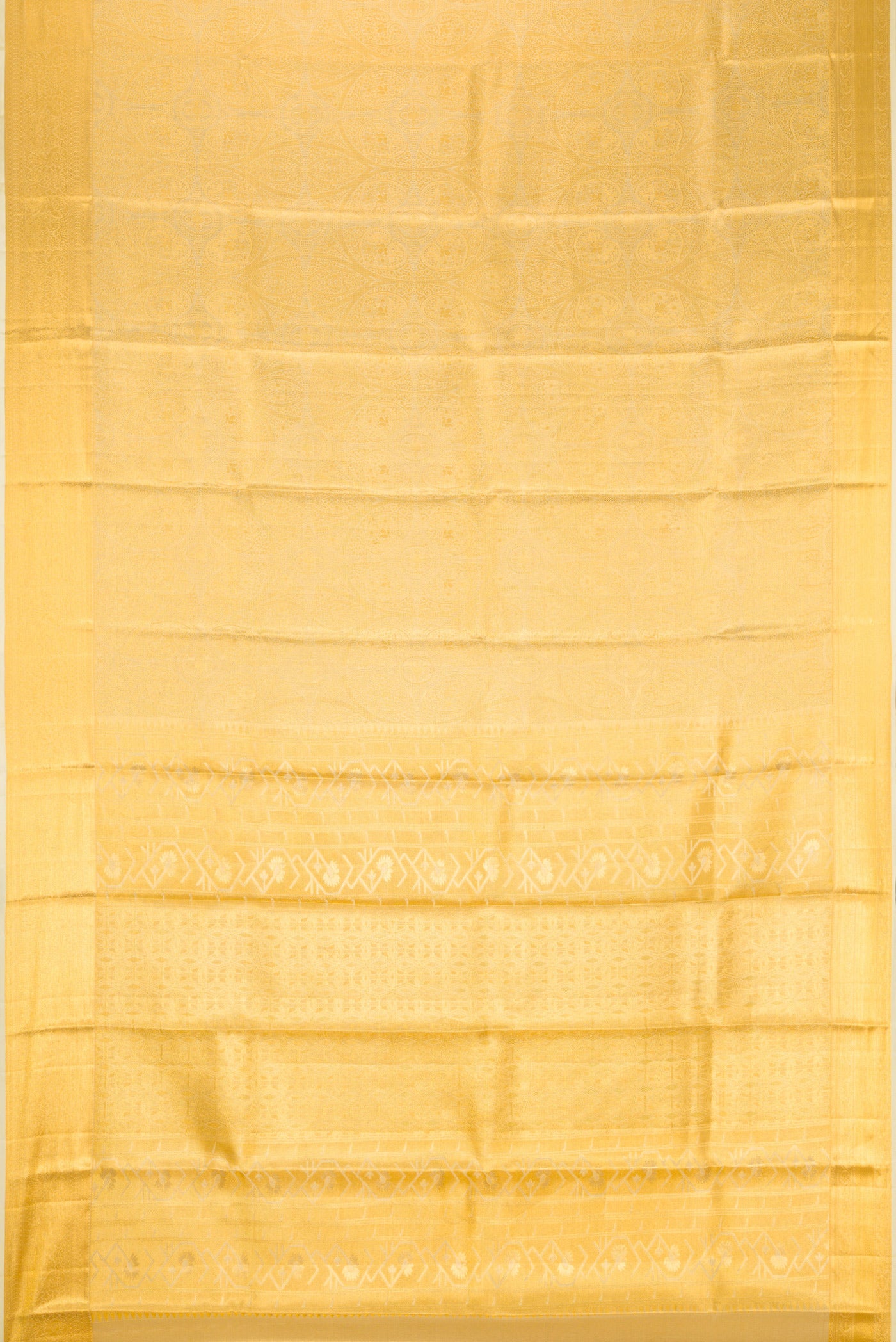 Flat view of Gold Dual Tone Kanchipuram Tissue Silk Saree with Zari Brocade on the body and Zari Border. 