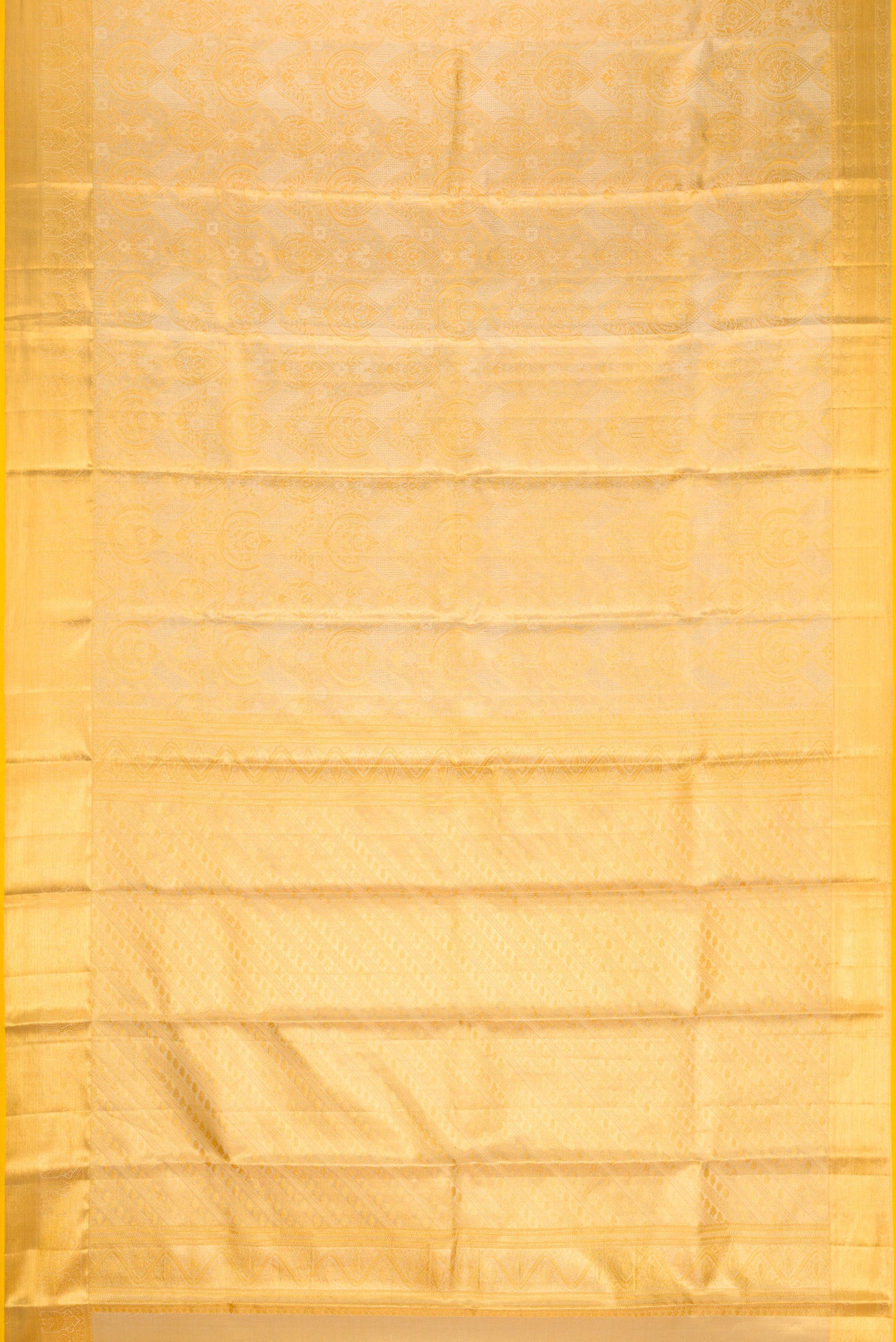 Flat view of Gold Dual Tone Kanchipuram Tissue Silk Saree with Zari Brocade on the body and Zari Border. 