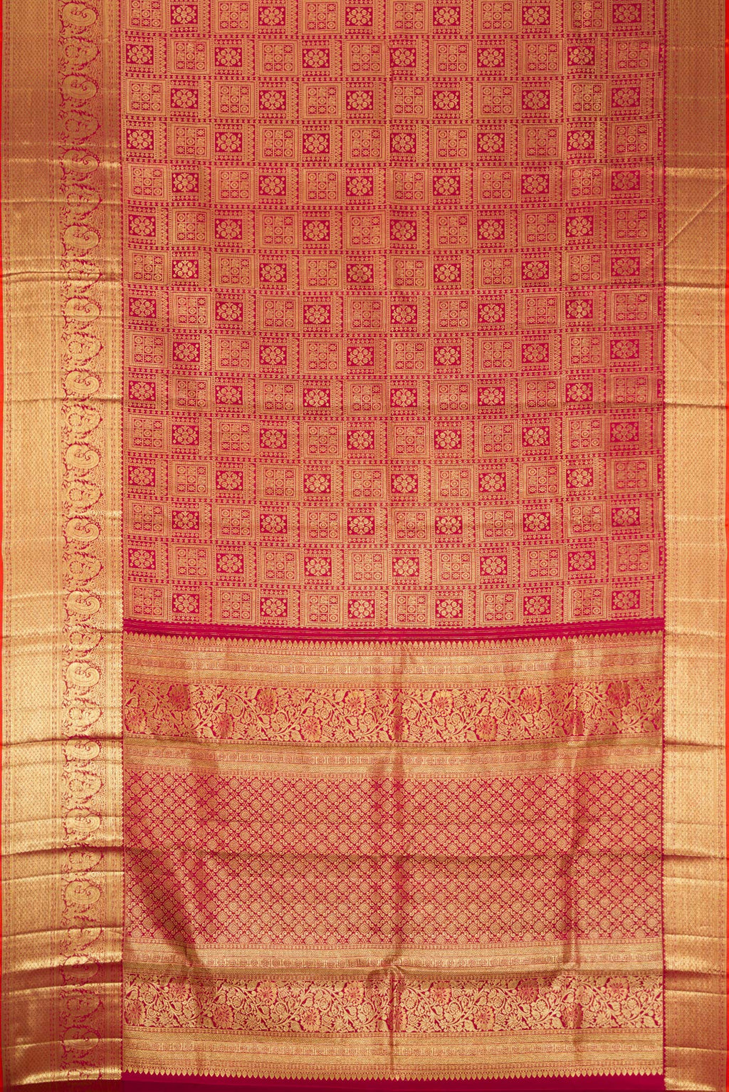 Flat view of Maroon Kanjivaram Silk Saree with Zari Brocade on the body and Zari Border. 