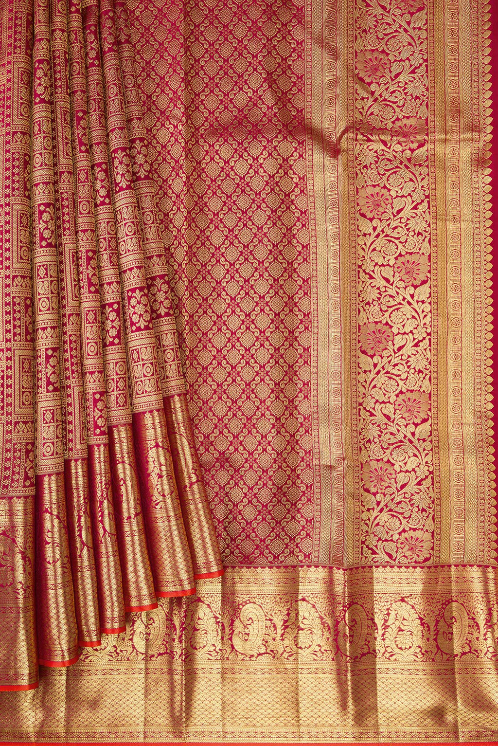 Pleats and pallu of Maroon Kanjivaram Silk Saree with Zari Brocade on the body and Zari Border. 