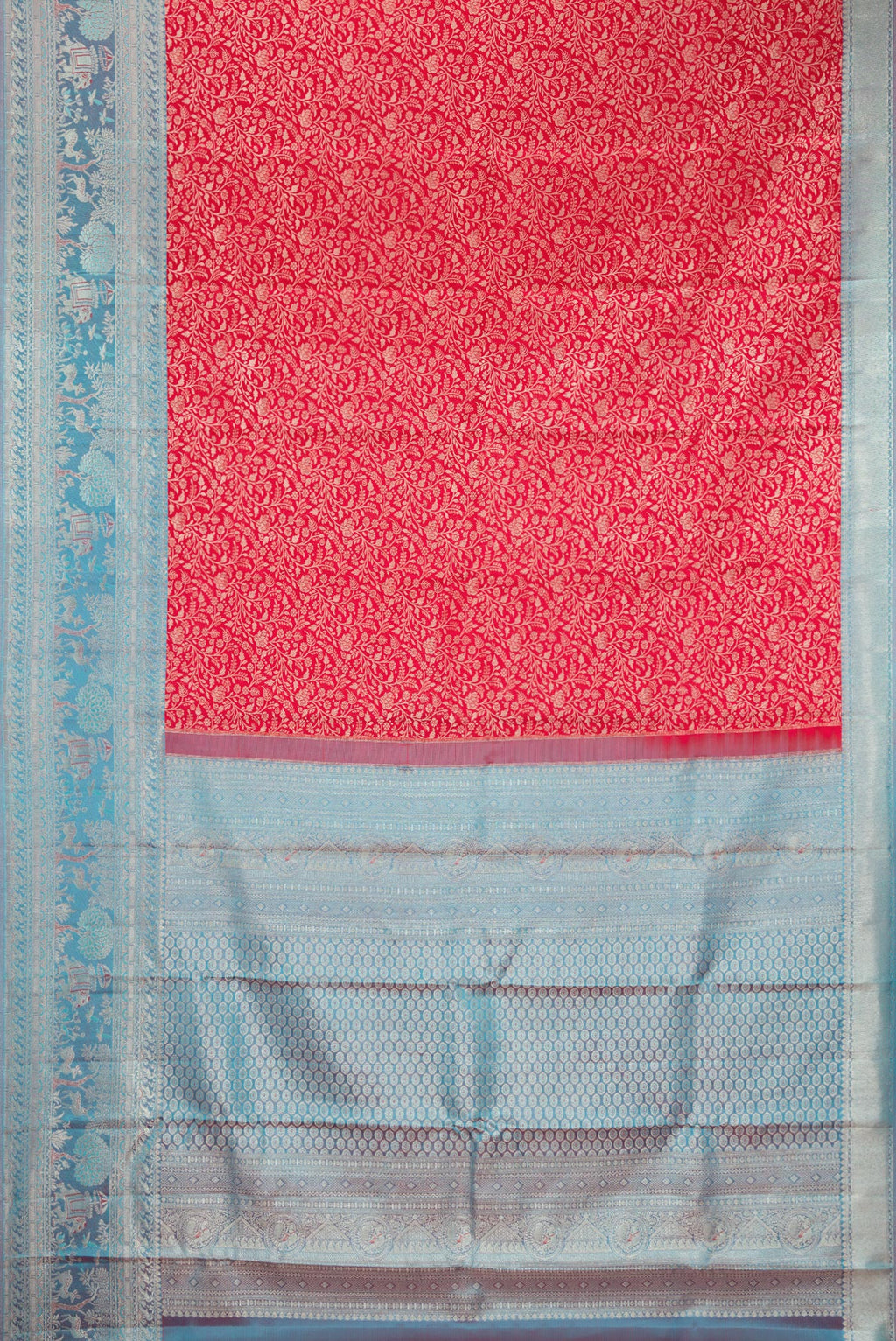 Flat view of Red Kanjivaram Silk Saree with Zari Brocade on the body and Fancy Border. 