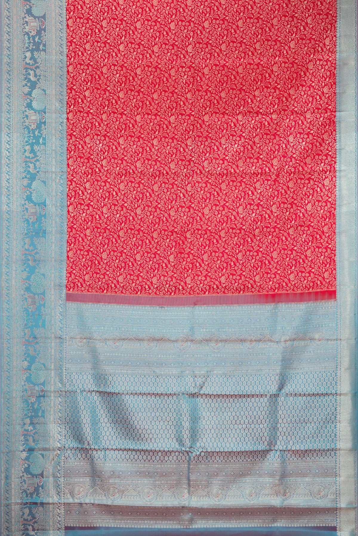 Flat view of Red Kanjivaram Silk Saree with Zari Brocade on the body and Fancy Border. 