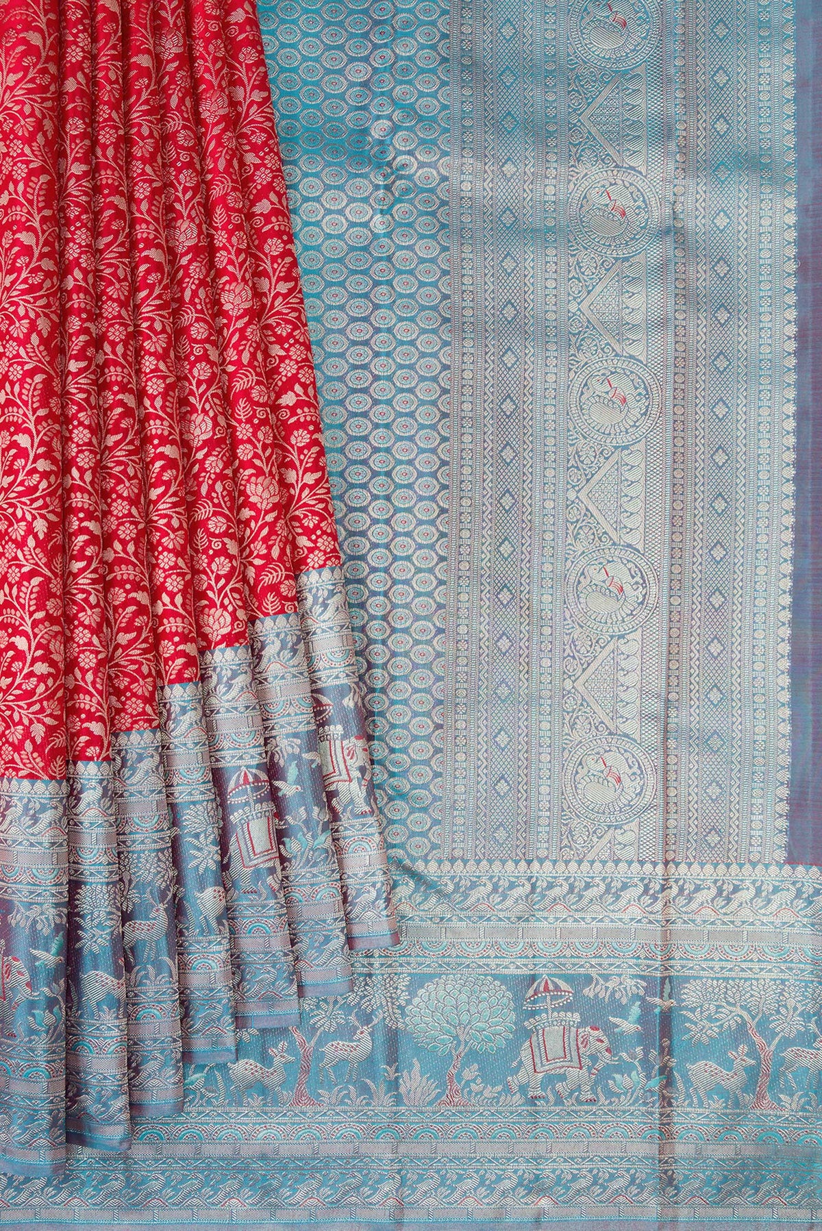 Pleats and pallu of Red Kanjivaram Silk Saree with Zari Brocade on the body and Fancy Border. 