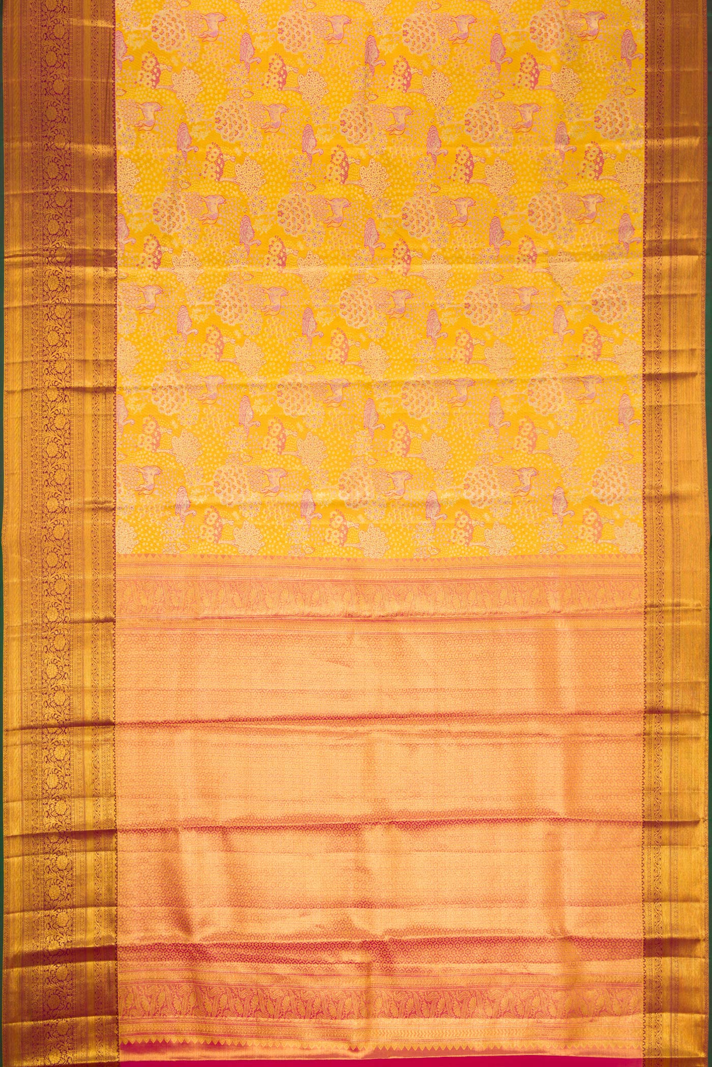 Flat view of Gold Dual Tone Kanjivaram Tissue Silk Saree with Zari Brocade on the body and Zari Border. 