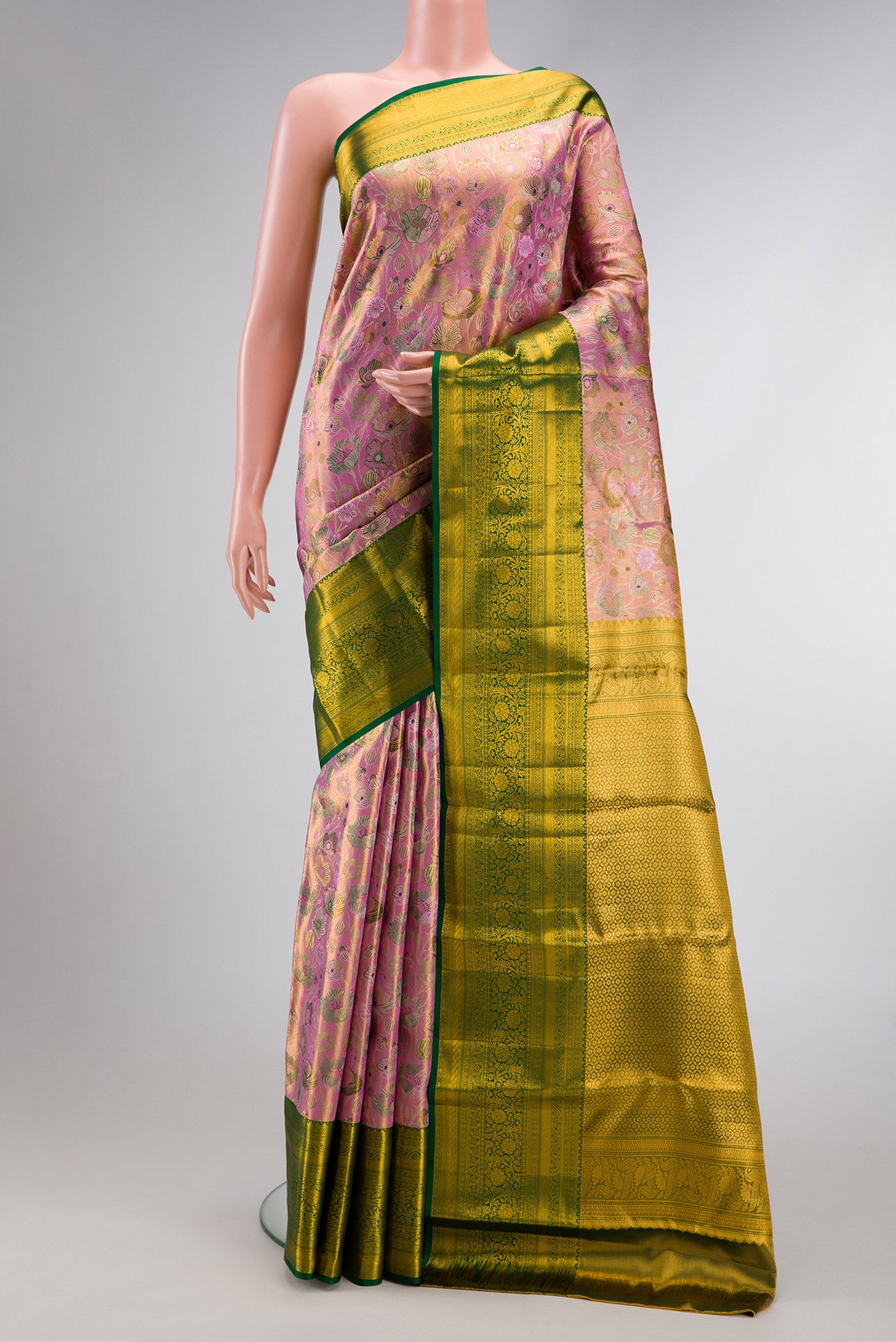 Pink Dual Tone Kanjivaram Tissue Silk Saree with Zari Brocade on the body and Zari Border.  displayed on a mannequin