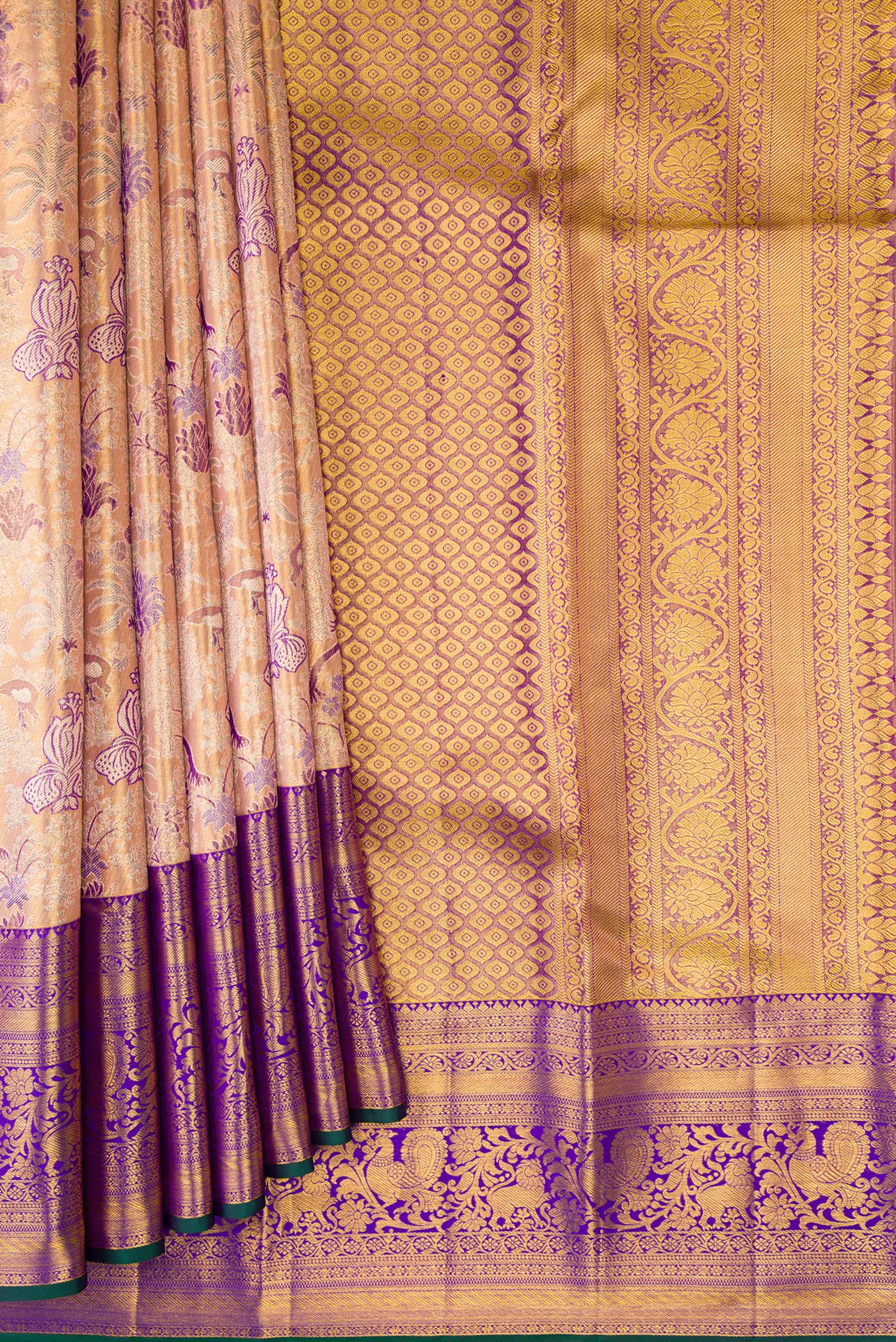 Pleats and pallu of Golden Peach Dual Tone Kanjivaram Tissue Silk Saree with Zari Brocade on the body and Zari Border. 