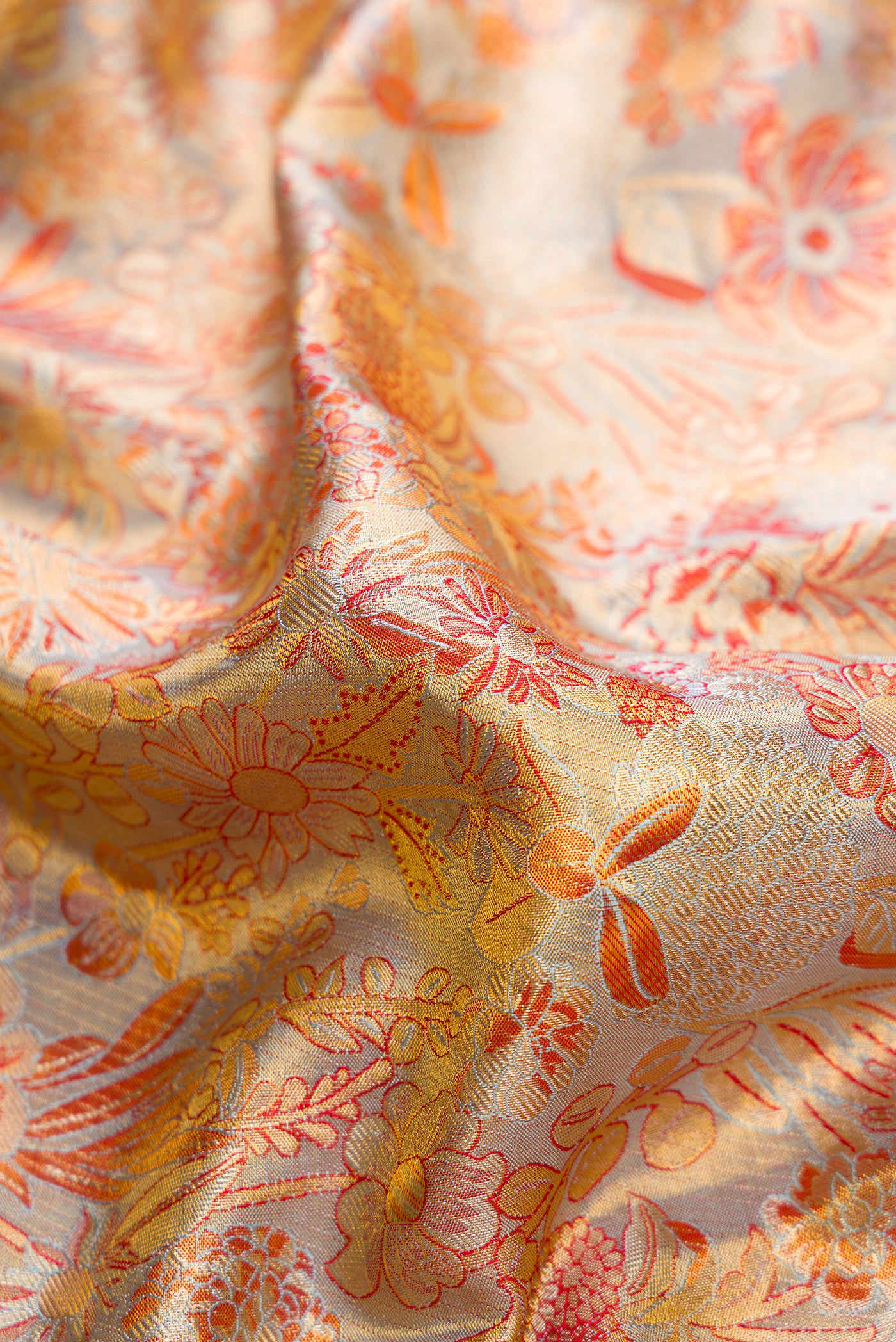 Close up of Light Blue Dual Tone Kanjivaram Tissue Silk Saree with Zari Brocade on the body and Zari Border.  displaying folds