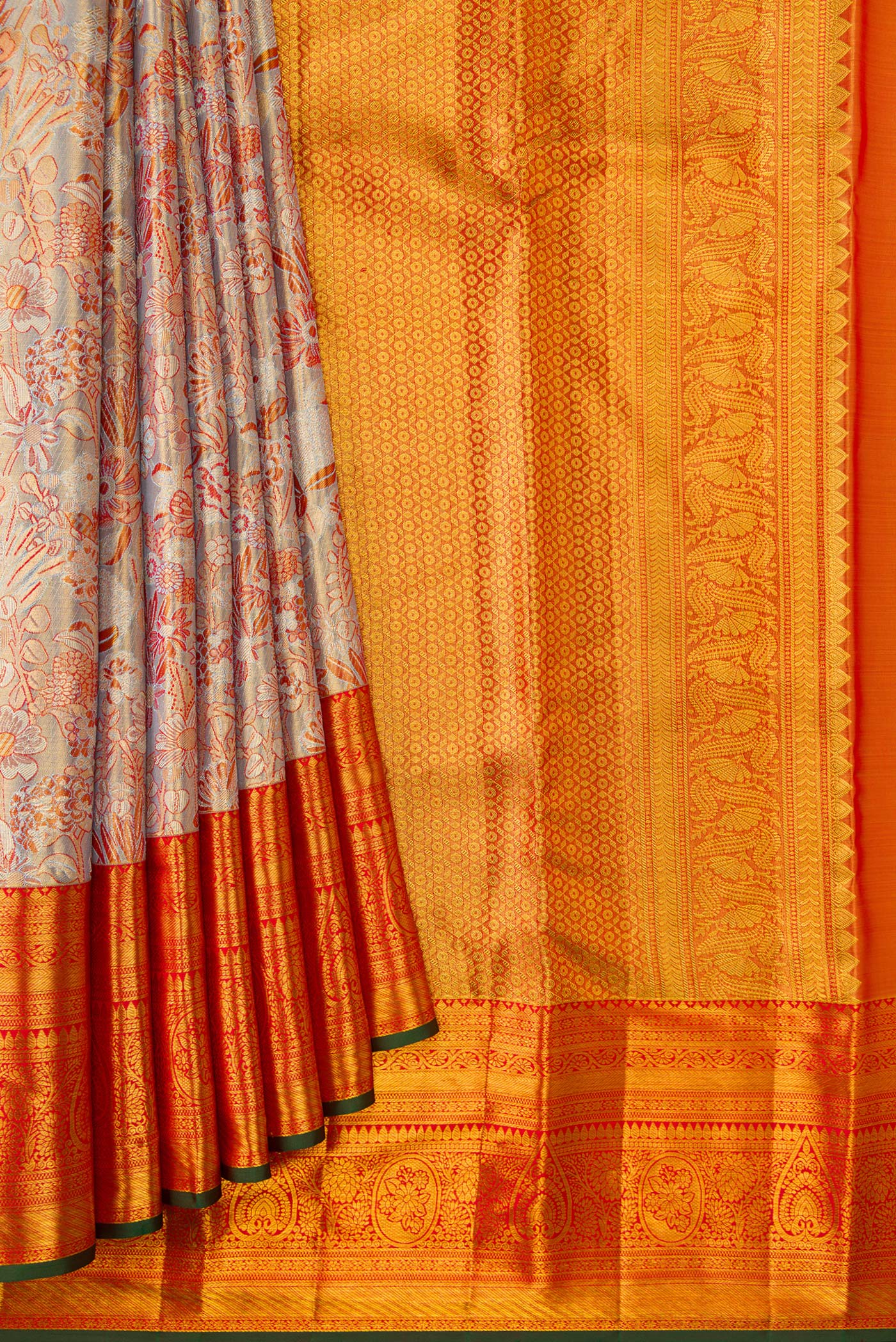 Pleats and pallu of Light Blue Dual Tone Kanjivaram Tissue Silk Saree with Zari Brocade on the body and Zari Border. 