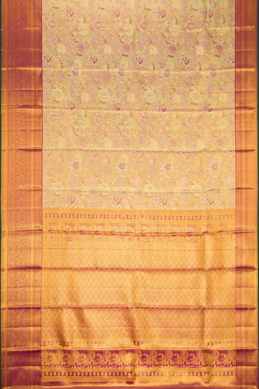 Flat view of Pista Green Dual Tone Kanjivaram Tissue Silk Saree with Zari Brocade on the body and Zari Border. 