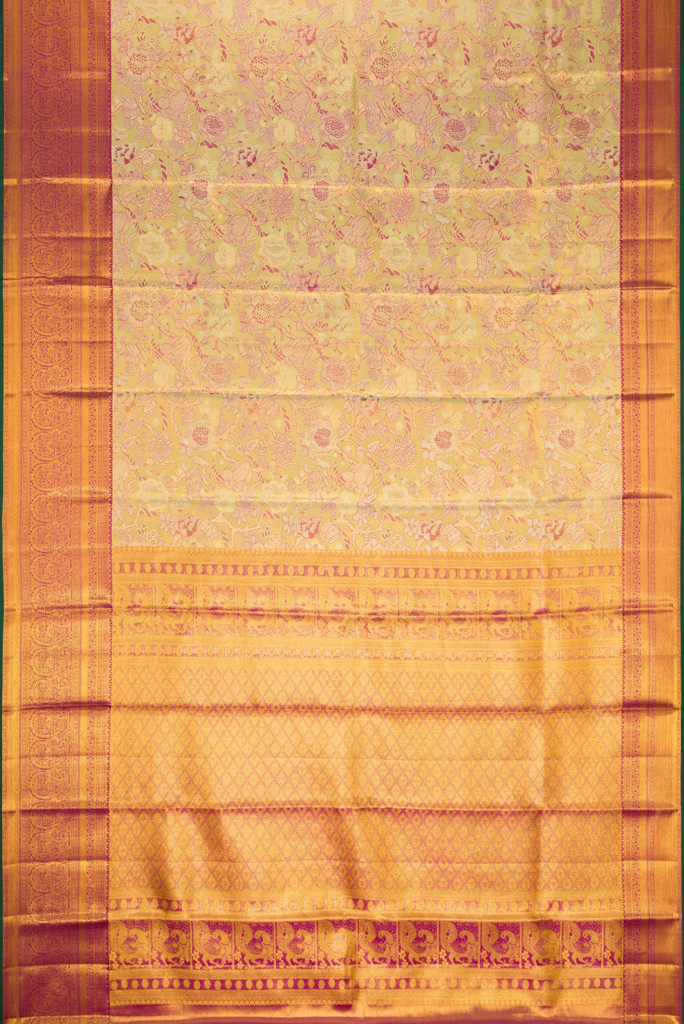 Flat view of Pista Green Dual Tone Kanjivaram Tissue Silk Saree with Zari Brocade on the body and Zari Border. 