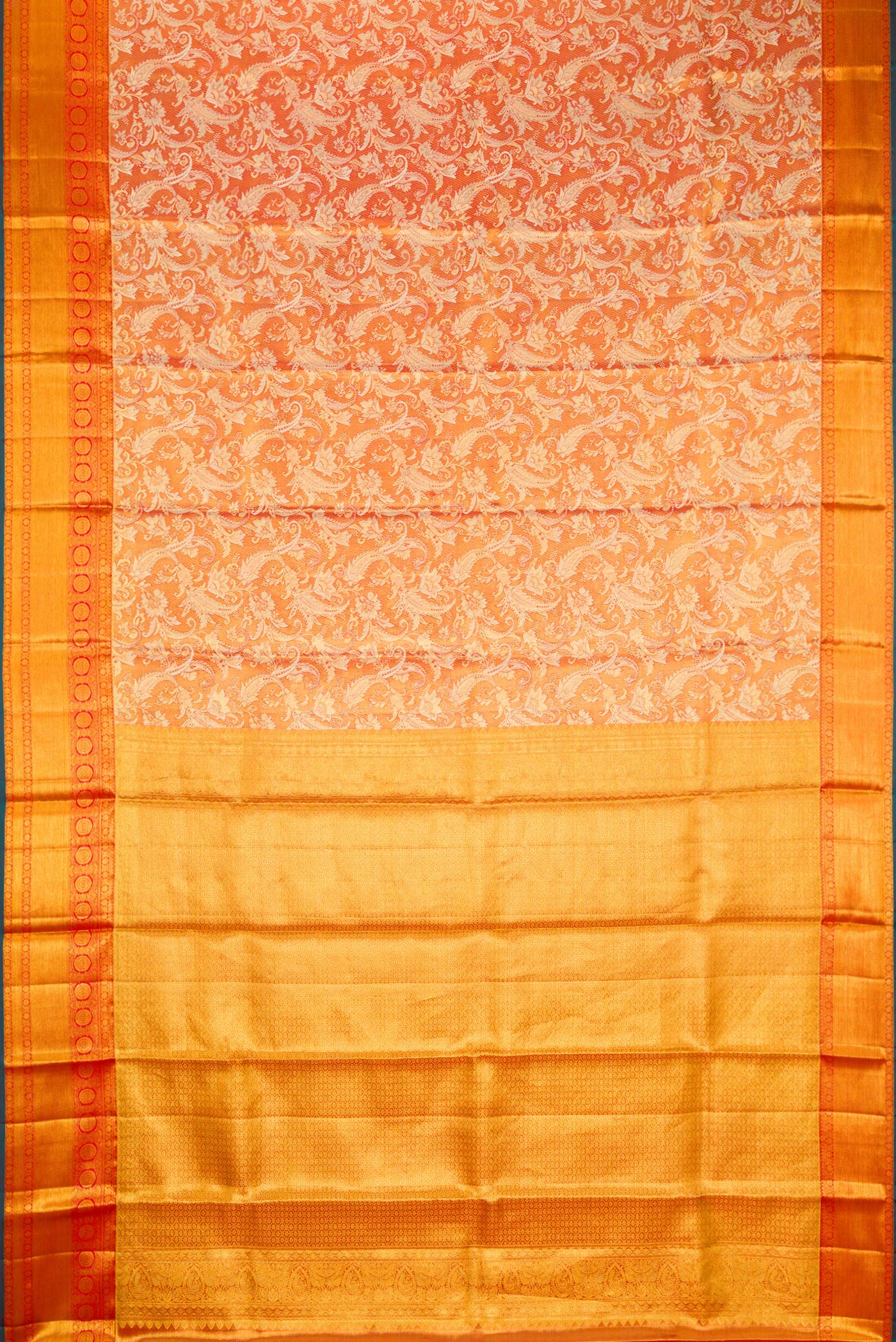 Flat view of Orange Dual Tone Kanjivaram Tissue Silk Saree with Zari Brocade on the body and Fancy Border. 