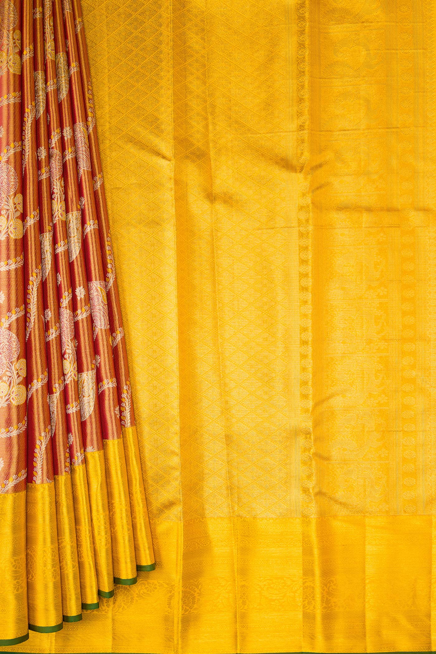 Pleats and pallu of Red Dual Tone Kanjivaram Tissue Silk Saree with Zari Brocade on the body and Zari Border. 