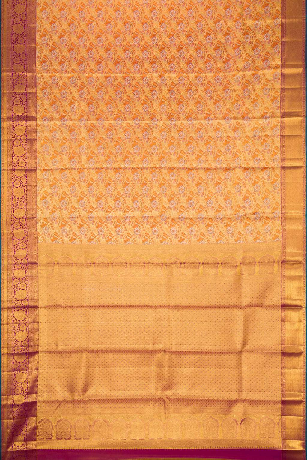 Flat view of Gold Dual Tone Kanjivaram Tissue Silk Saree with Zari Brocade on the body and Zari Border. 