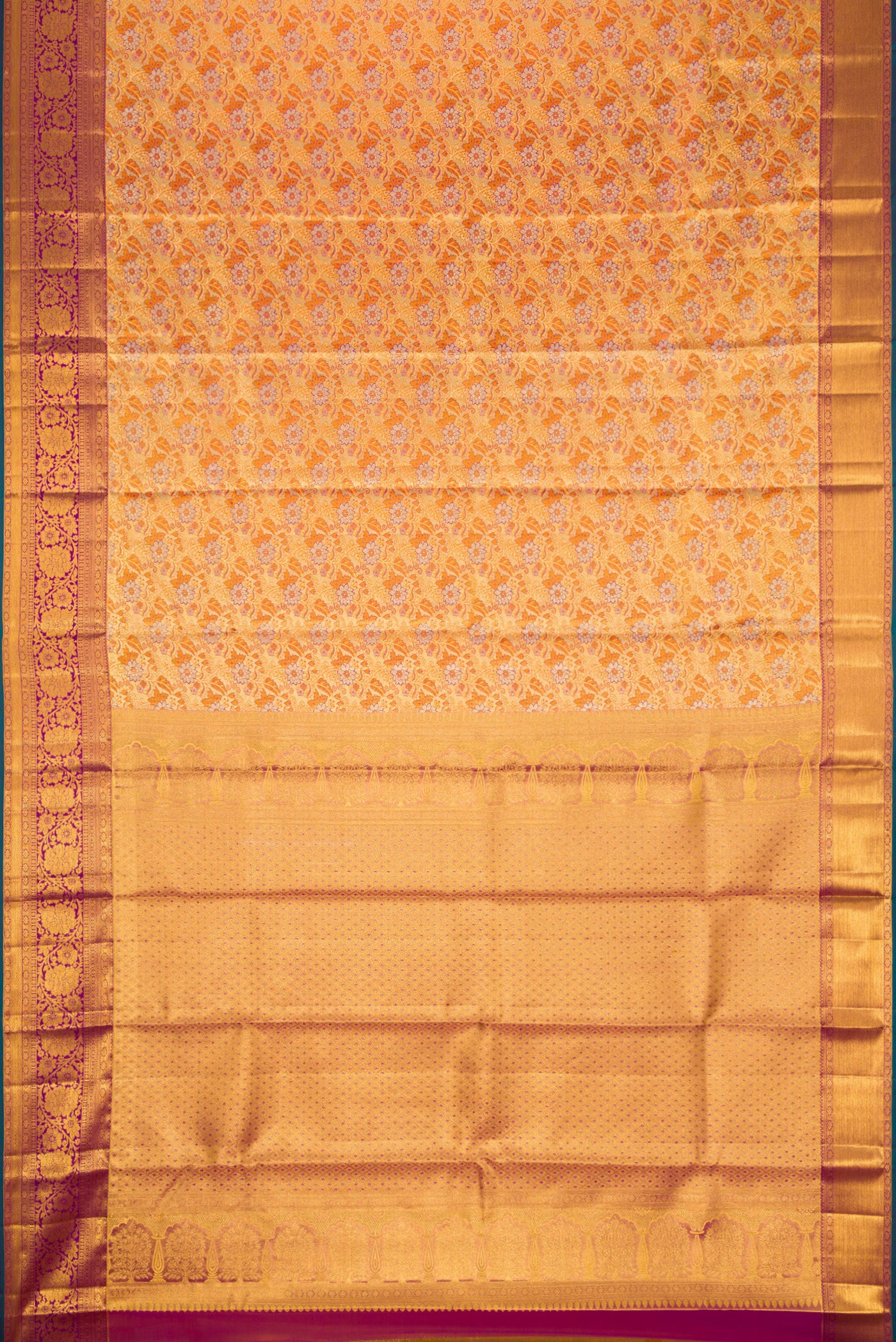 Flat view of Gold Dual Tone Kanjivaram Tissue Silk Saree with Zari Brocade on the body and Zari Border. 