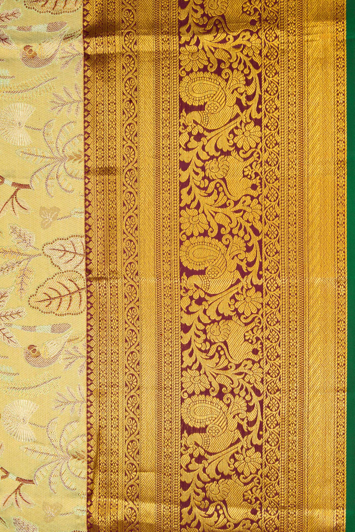 Border image of Gold Dual Tone Kanjivaram Tissue Silk Saree with Zari Brocade on the body and Zari Border. 