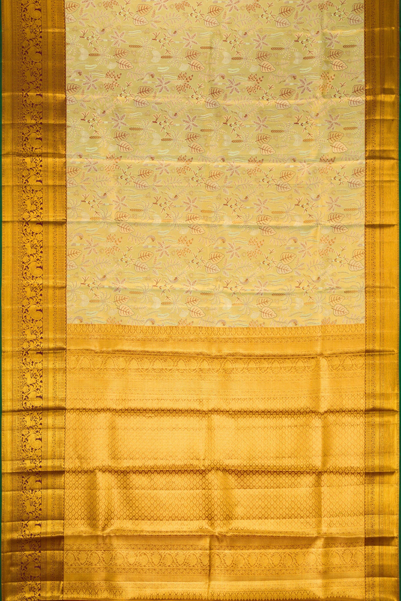 Flat view of Gold Dual Tone Kanjivaram Tissue Silk Saree with Zari Brocade on the body and Zari Border. 