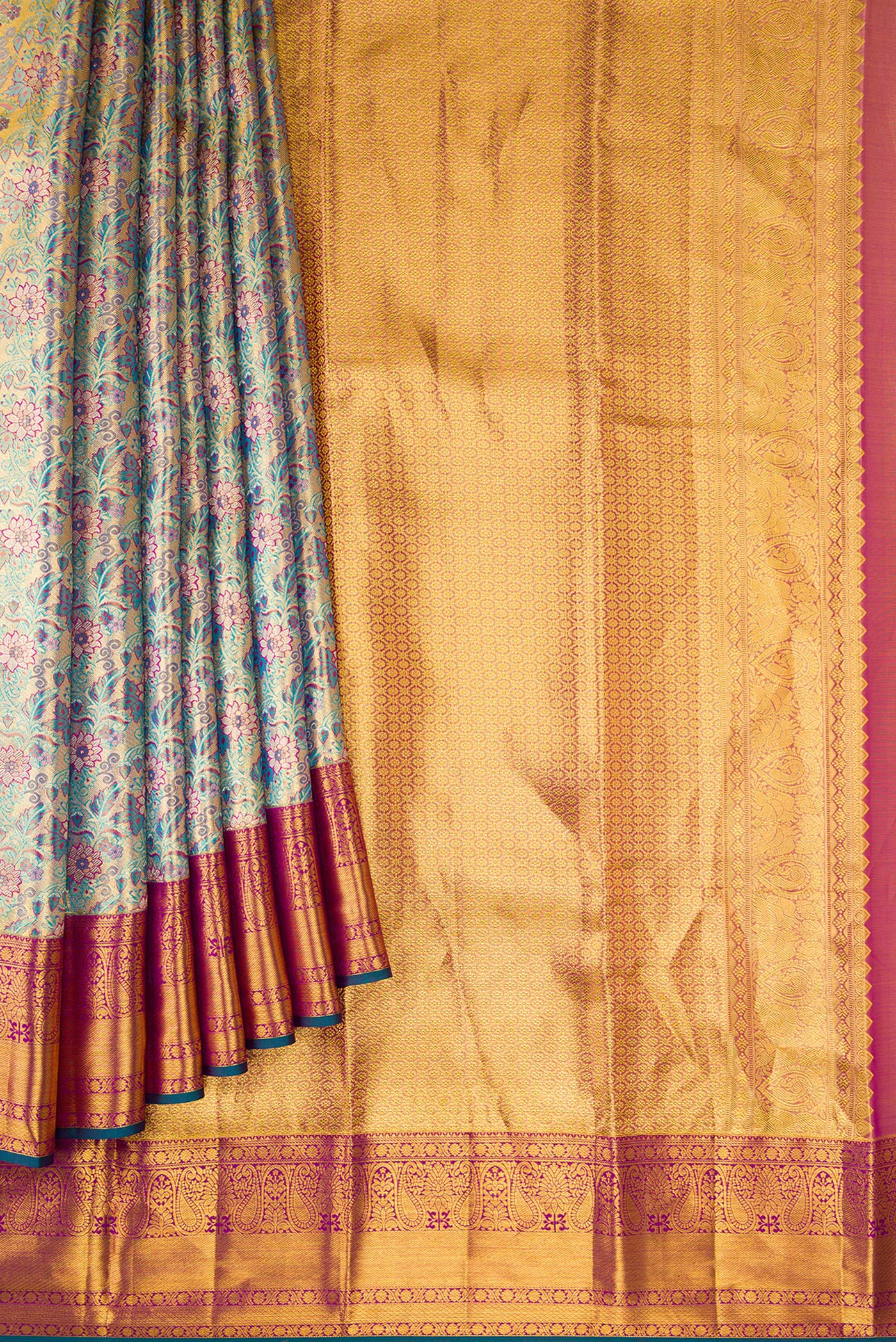 Pleats and pallu of Gold Dual Tone Kanjivaram Tissue Silk Saree with Zari Brocade on the body and Zari Border. 