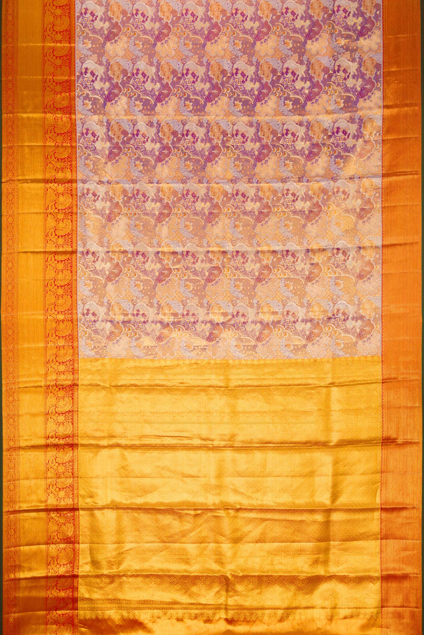 Flat view of Lavender Dual Tone Kanjivaram Tissue Silk Saree with Zari Brocade on the body and Zari Border. 