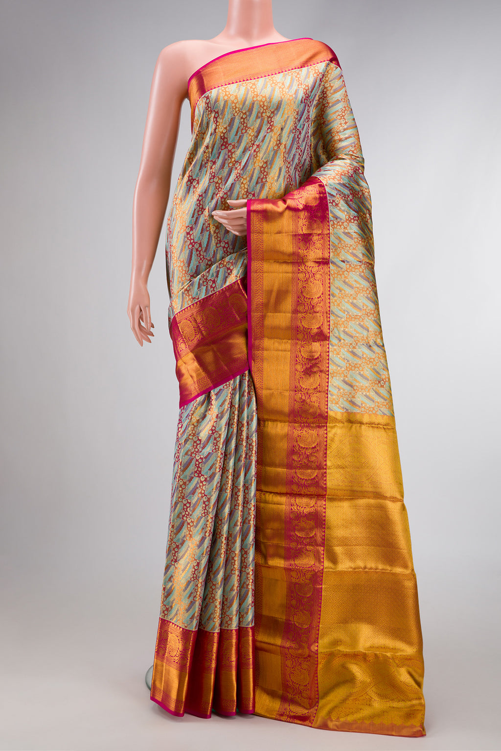 Sky Blue Dual Tone Kanjivaram Tissue Silk Saree with Zari Brocade on the body and Zari Border.  displayed on a mannequin