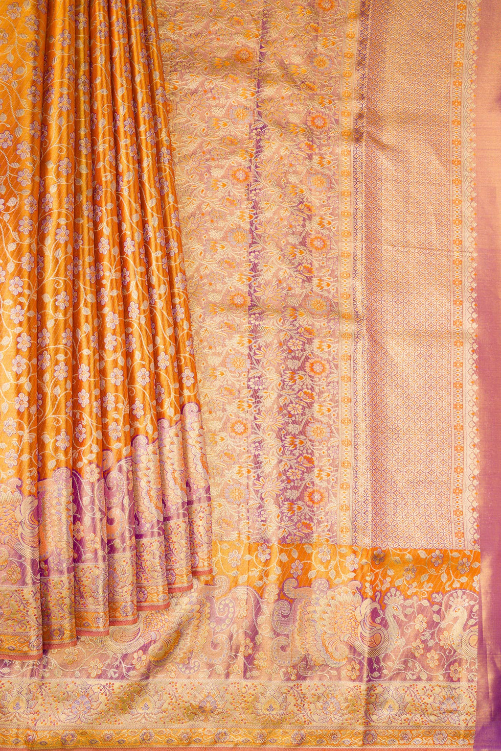 Pleats and pallu of Golden Peach Dual Tone Kanjivaram Tissue Silk Saree with Zari Brocade on the body and Fancy Border. 