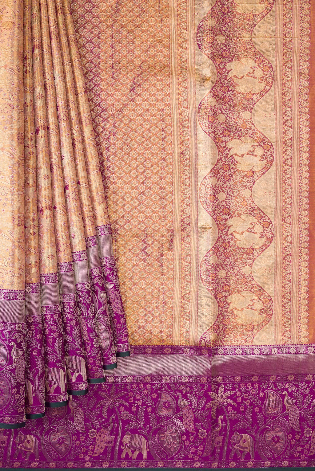 Pleats and pallu of Gold Dual Tone Kanjivaram Tissue Silk Saree with Zari Brocade on the body and Zari Border. 