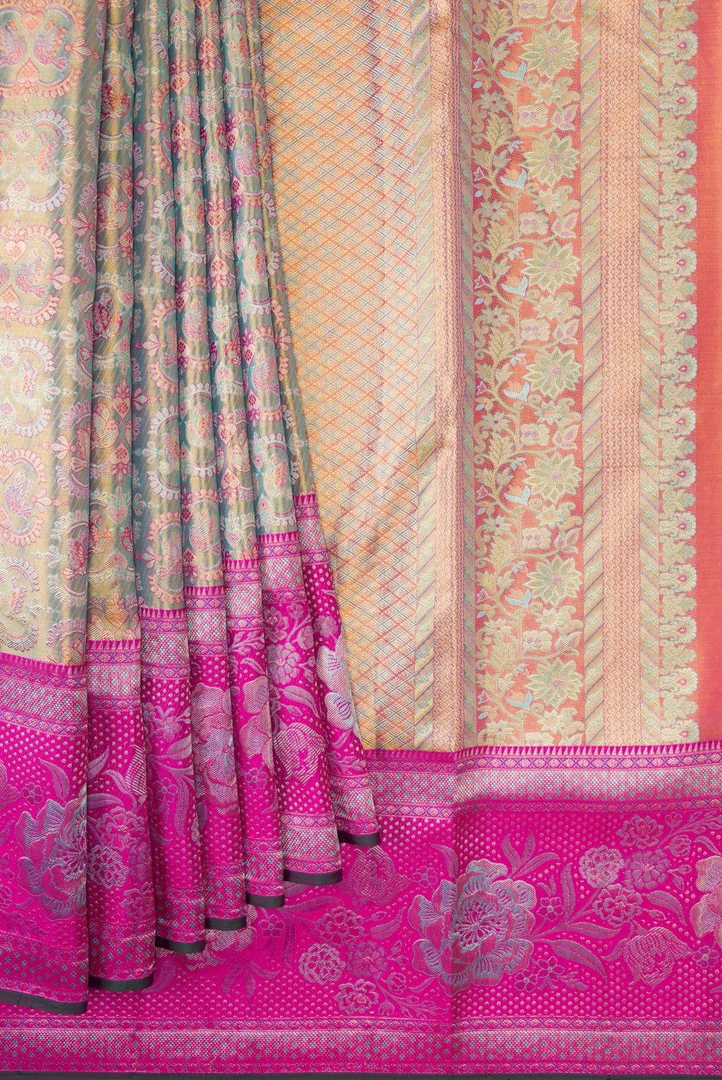 Pleats and pallu of Sea Green Dual Tone Kanjivaram Tissue Silk Saree with Zari Brocade on the body and Fancy Border. 