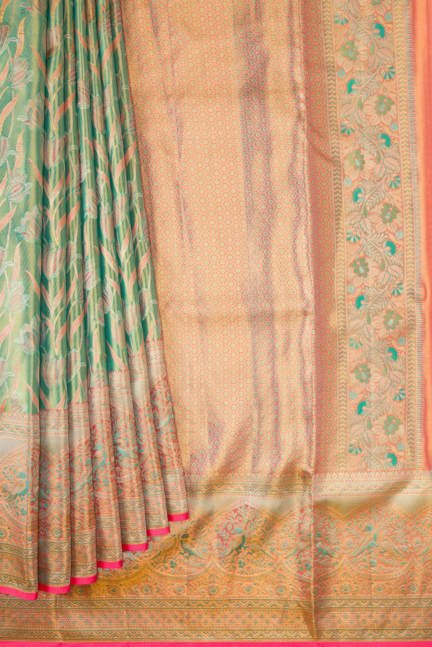 Pleats and pallu of Green Dual Tone Kanjivaram Tissue Silk Saree with Zari Brocade on the body and Fancy Border. 