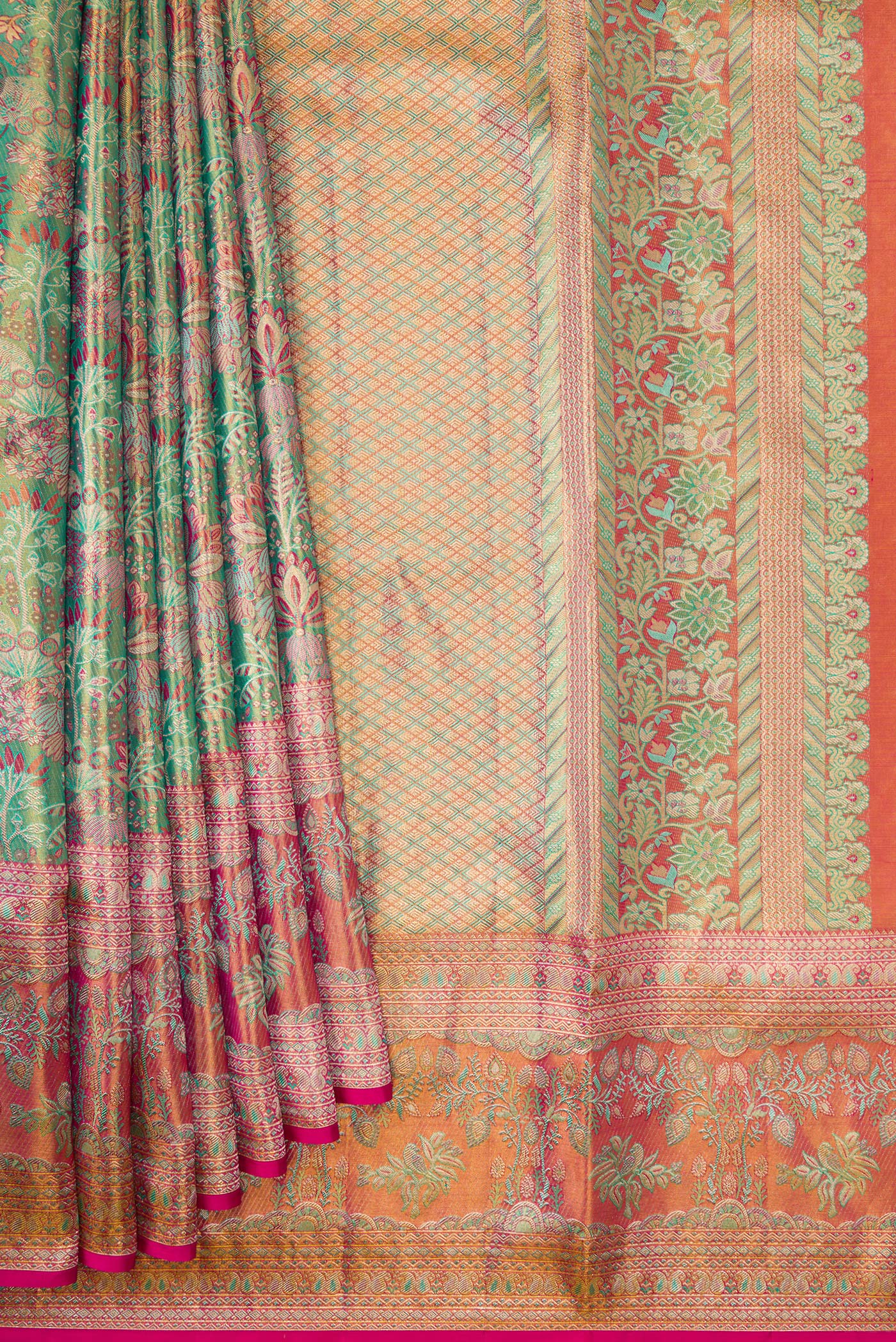 Pleats and pallu of Sea Green Dual Tone Kanjivaram Tissue Silk Saree with Zari Brocade on the body and Fancy Border. 