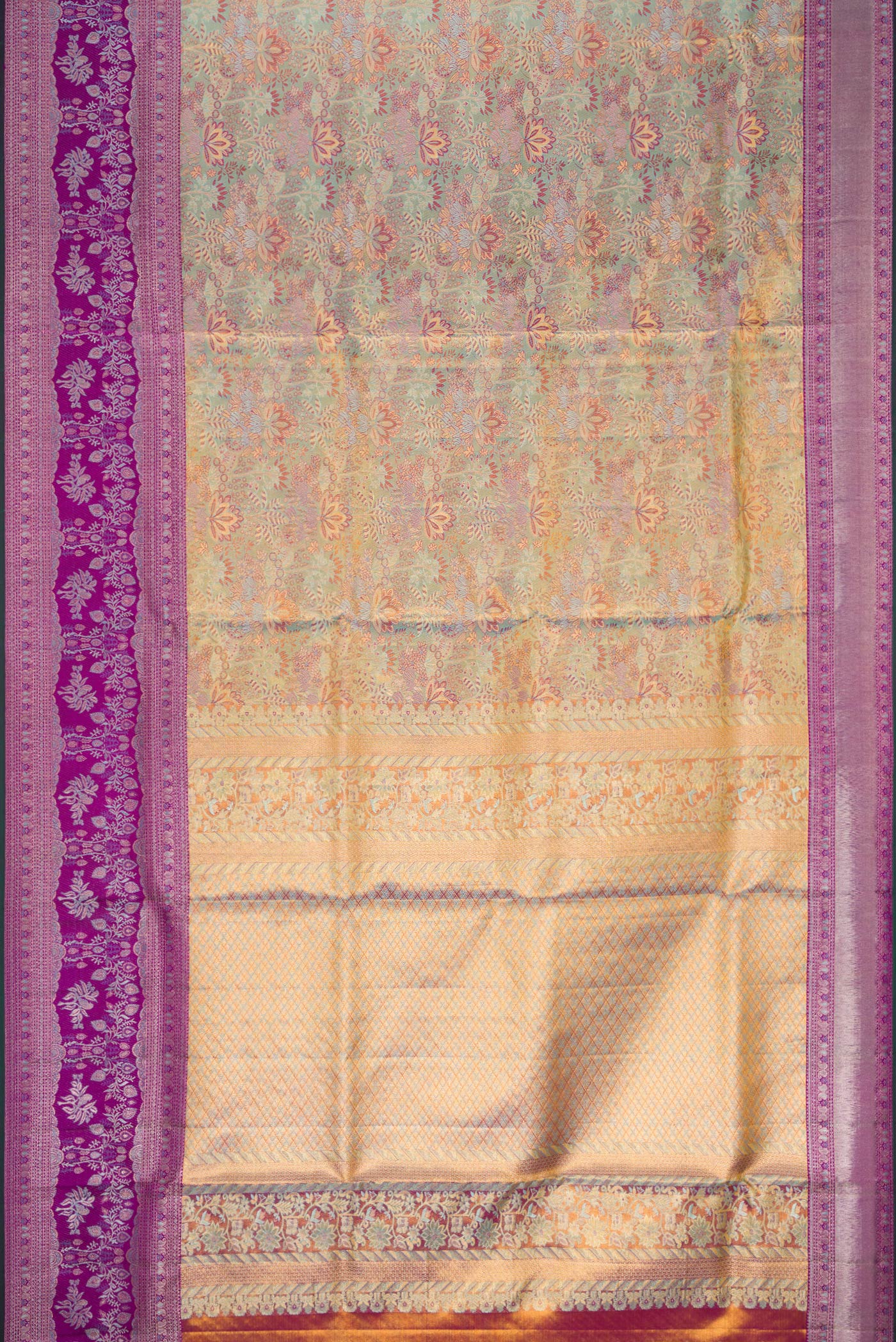 Flat view of Gold Dual Tone Kanjivaram Tissue Silk Saree with Zari Brocade on the body and Zari Border. 