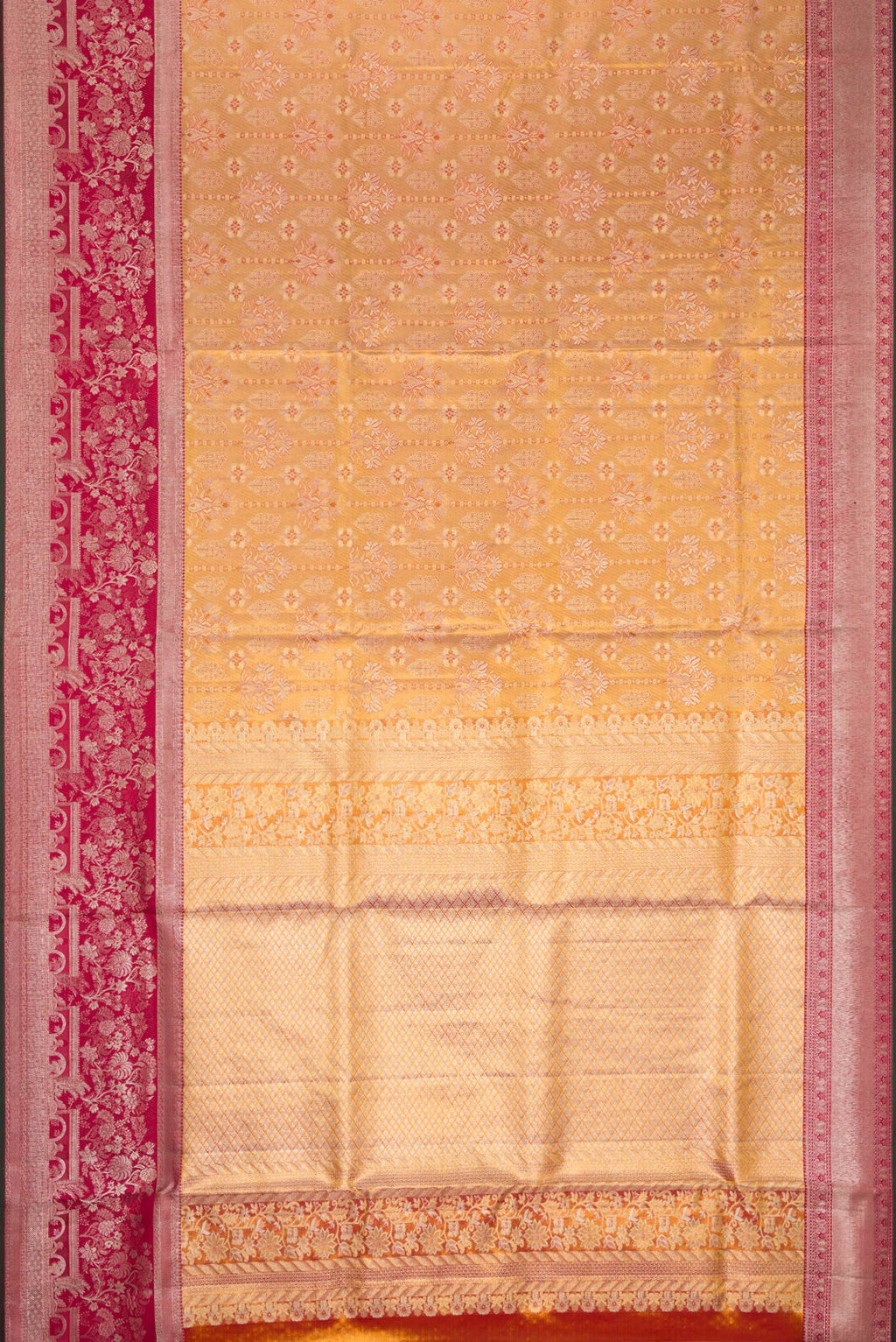 Flat view of Gold Dual Tone Kanjivaram Tissue Silk Saree with Zari Brocade on the body and Zari Border. 