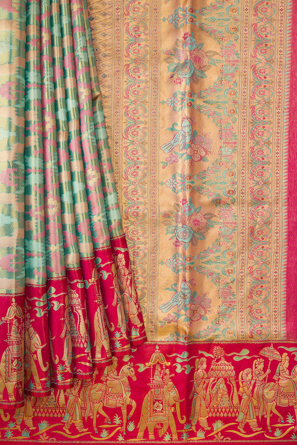 Pleats and pallu of Sea Green Dual Tone Kanjivaram Tissue Silk Saree with Zari Brocade on the body and Fancy Border. 