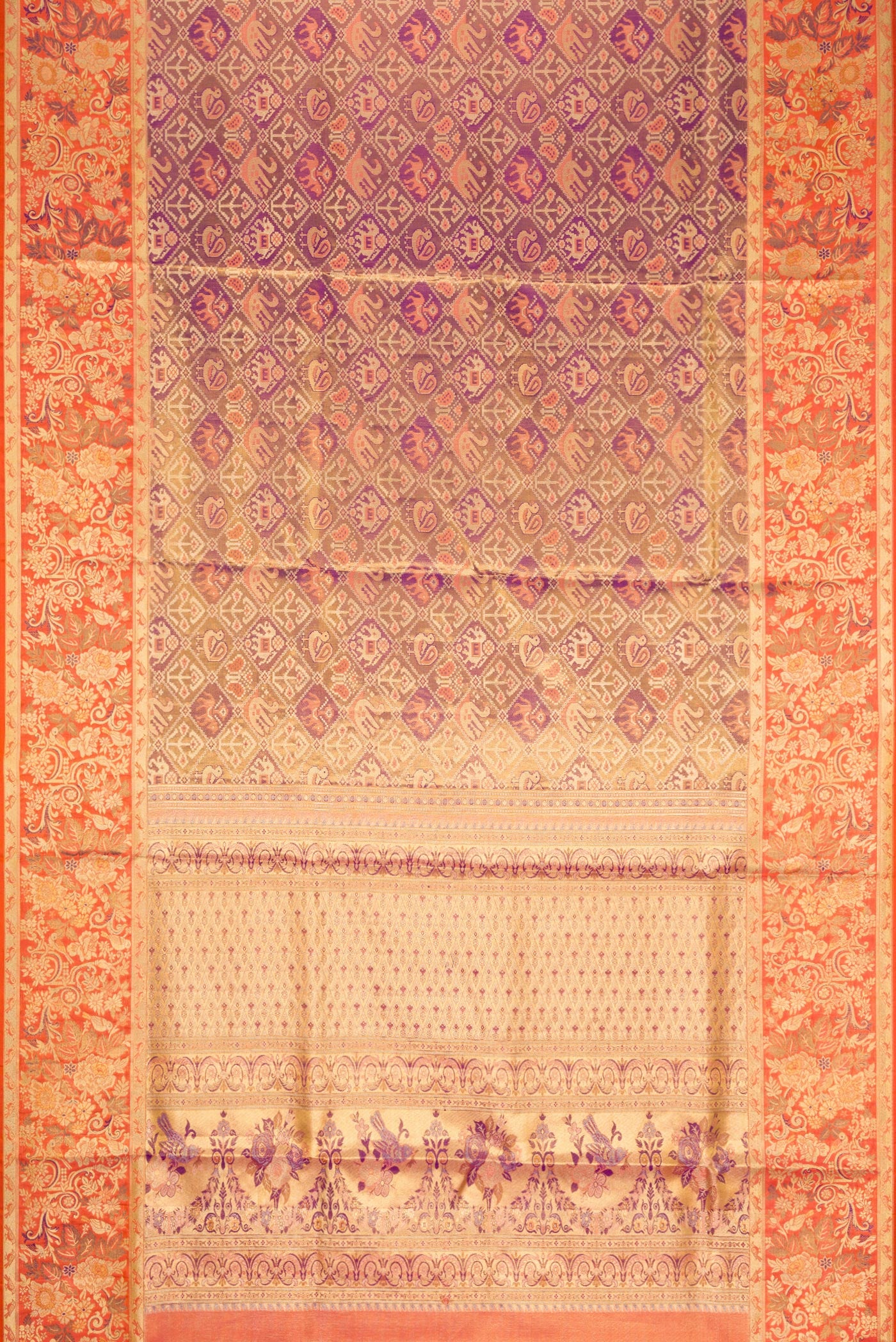 Flat view of Lavender Dual Tone Kanjivaram Tissue Silk Saree with Zari Brocade on the body and Zari Border. 
