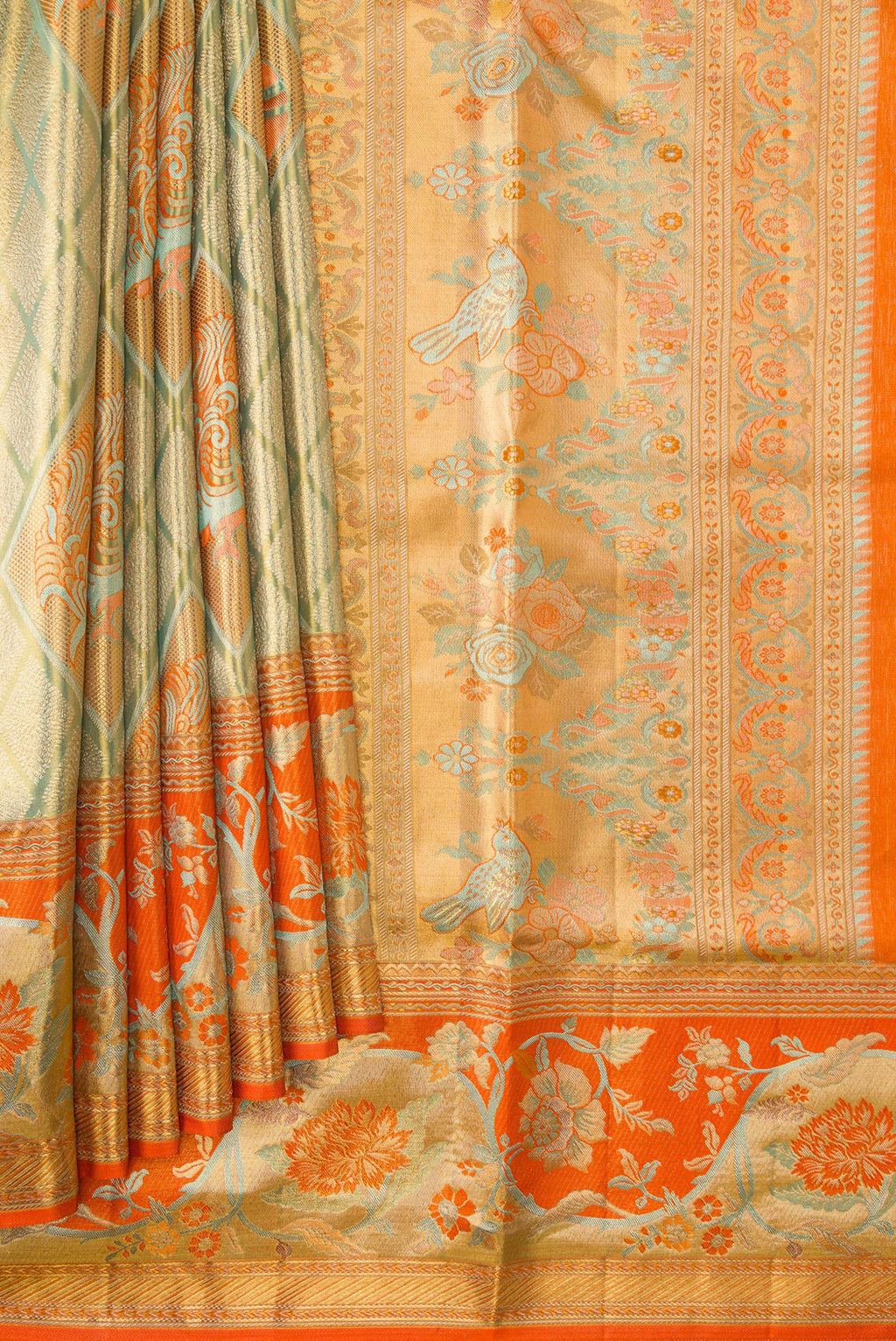 Pleats and pallu of Light Green Dual Tone Kanjivaram Tissue Silk Saree with Zari Brocade on the body and Zari Border. 