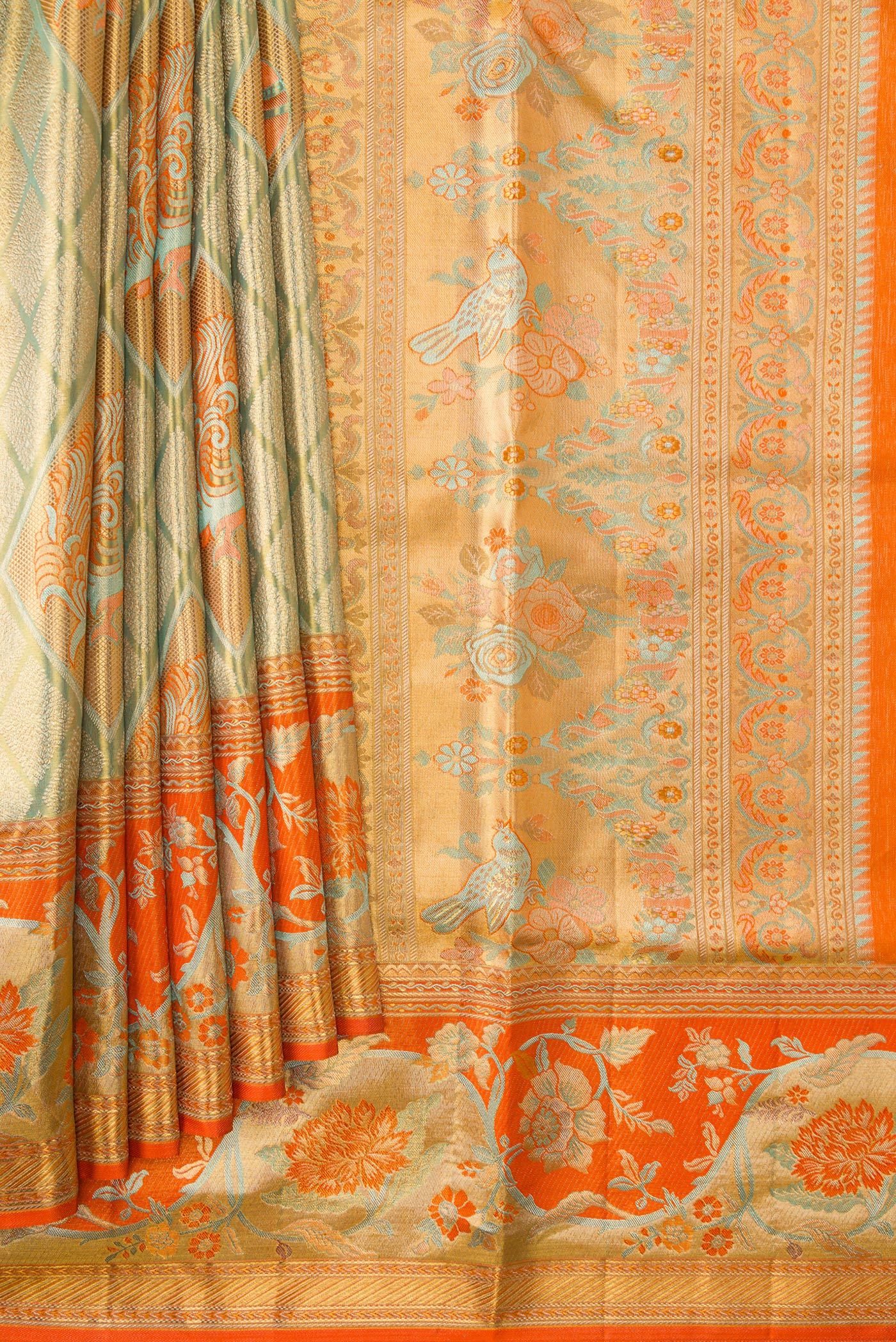 Pleats and pallu of Light Green Dual Tone Kanjivaram Tissue Silk Saree with Zari Brocade on the body and Zari Border. 